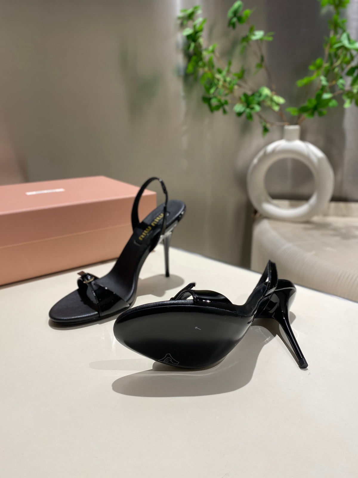 TWO STRAP HIGH HEELED SANDALS IN BLACK GLOSSY SHEEPSKIN