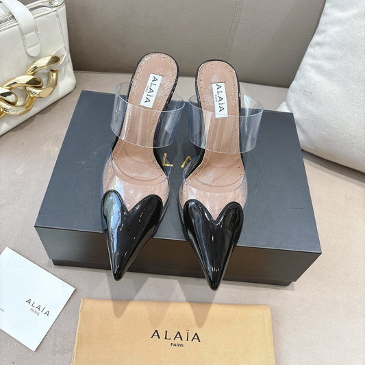 ALAIA 26S HIGH-HEEL WEDGE MULES 95 MM IN BLACK GLOSSY CALFSKIN