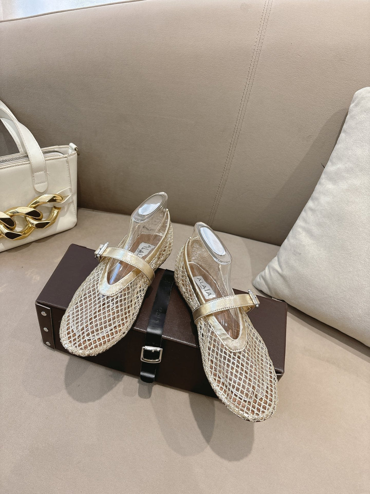 ALAIA 26S MESH FLATS IN LIGHT GOLD LAMBSKIN
