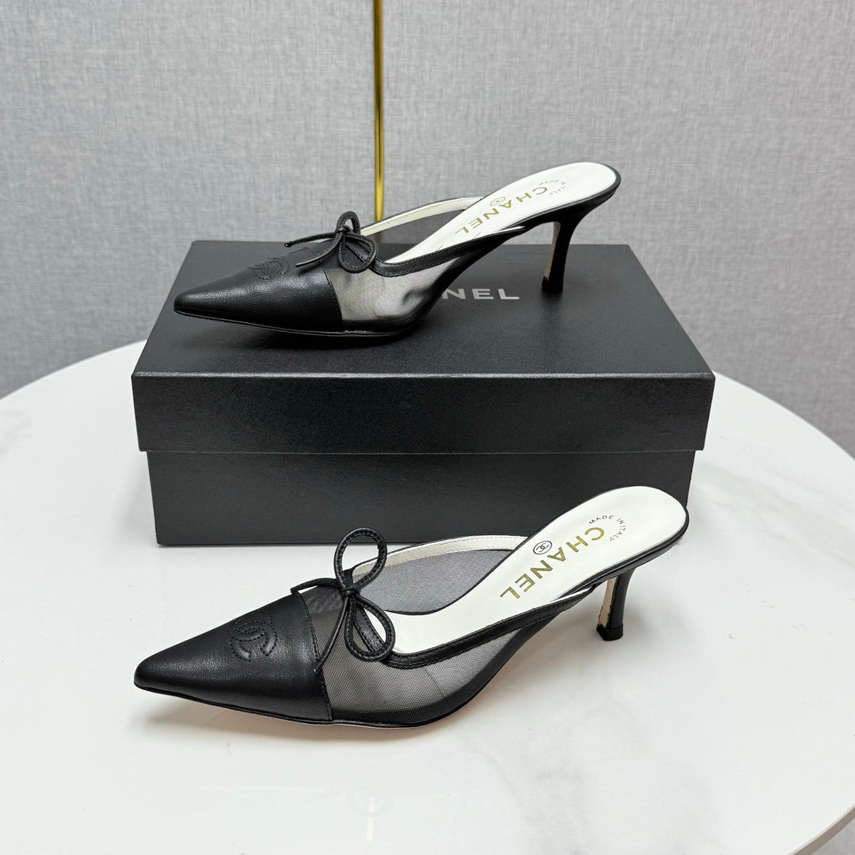 CC HEEL MULES 25S IN BLACK MESH FABRIC AND LAMBSKIN WITH BOW