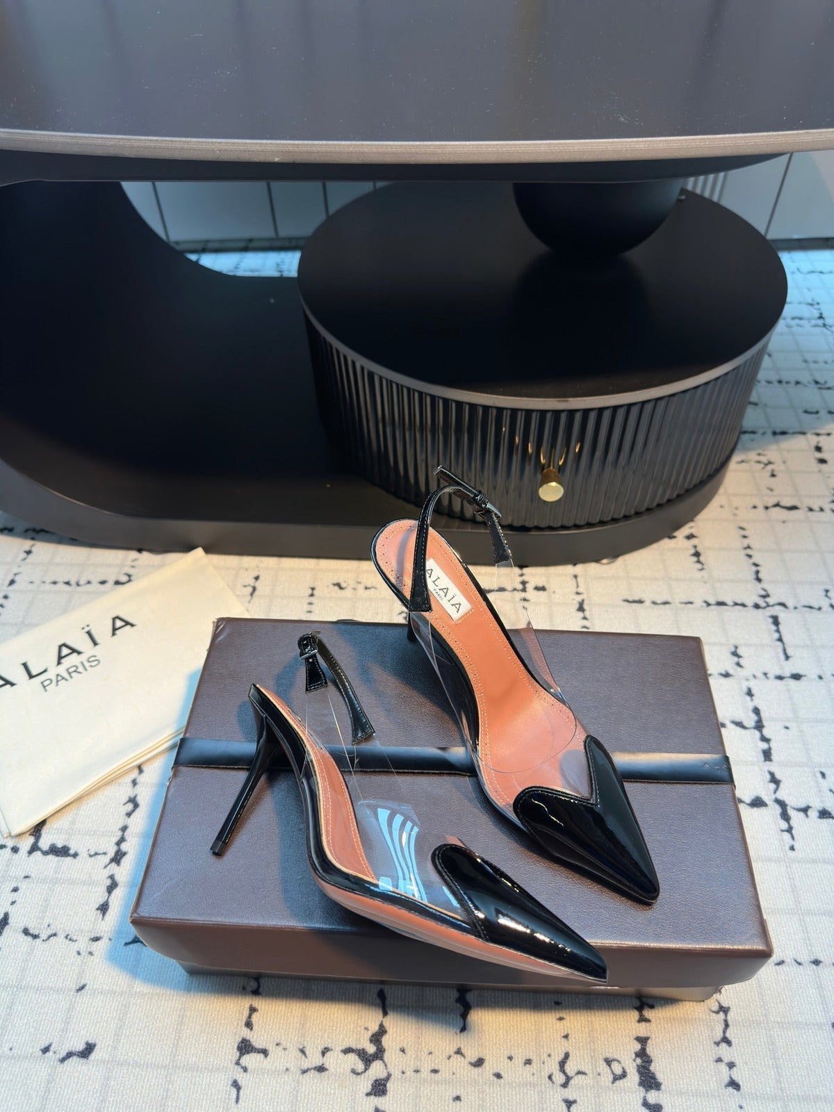 ALAIA HIGH SLINGBACK 25S 90 MM IN BLACK CALFSKIN