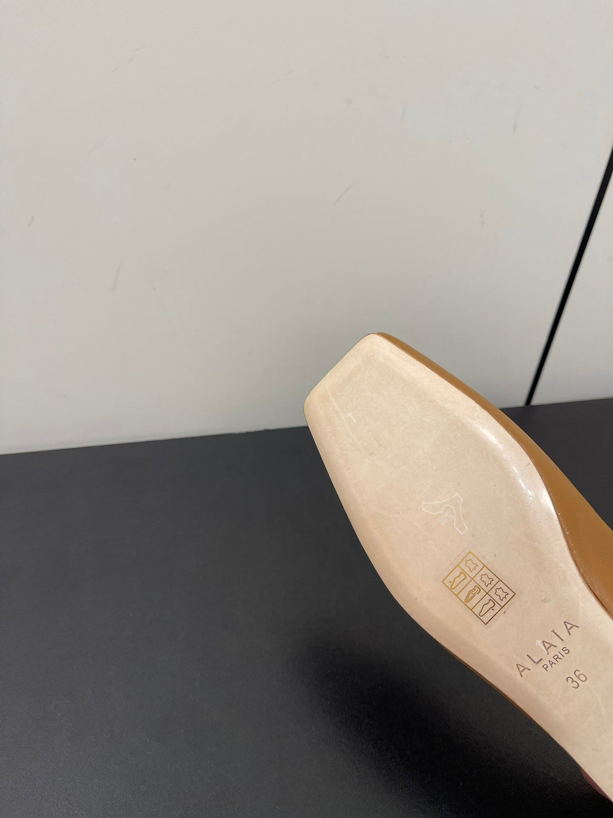 ALAIA BALLET FLATS IN COPPER BROWN SMOOTH CALFSKIN