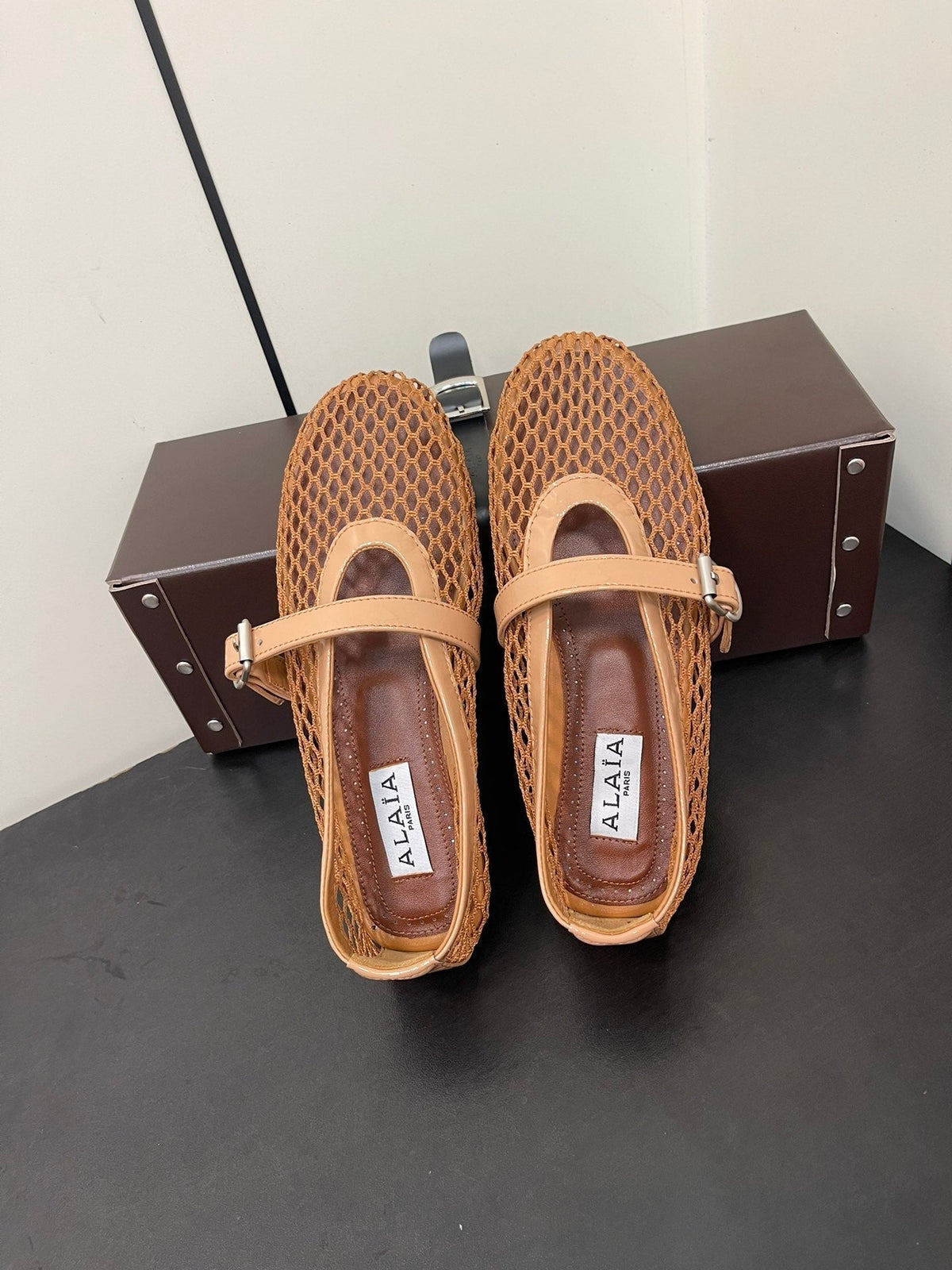 ALAIA BALLET FLATS IN COPPER BROWN MESH FISHNET