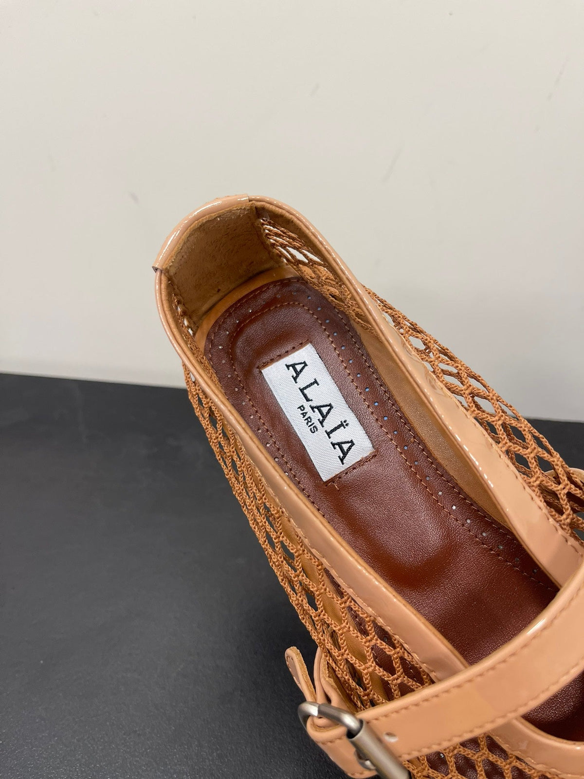 ALAIA BALLET FLATS IN COPPER BROWN MESH FISHNET