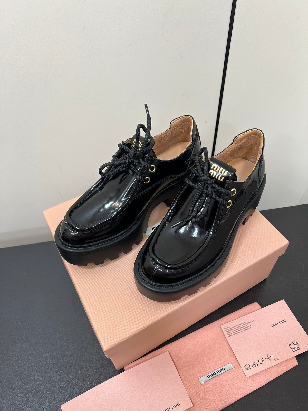 LACE-UP LOAFERS WITH THICK SOLE IN BLACK SHINY SHEEPSKIN