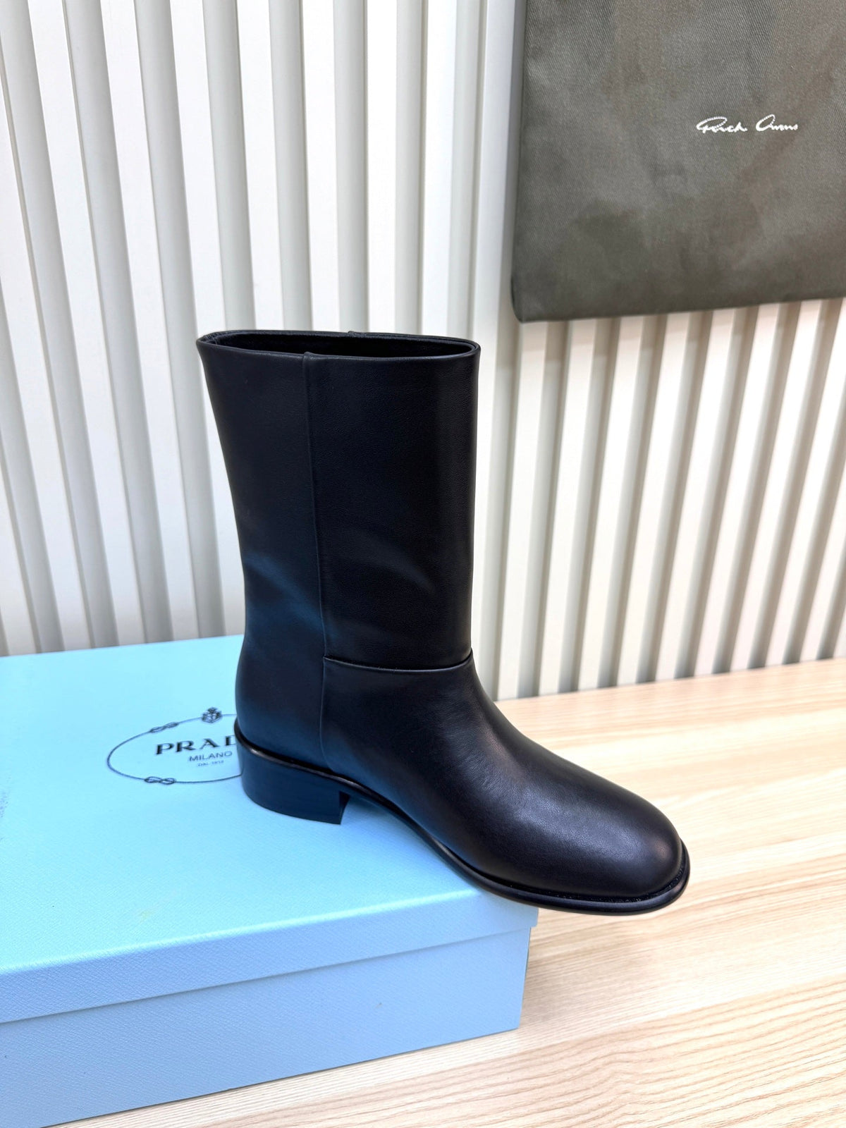PRADA 25S LOW-CUT BOOTS IN BLACK LAMBSKIN