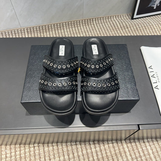 ALAIA DOUBLE-STRAP SANDALS 25S IN BLACK CALFSKIN