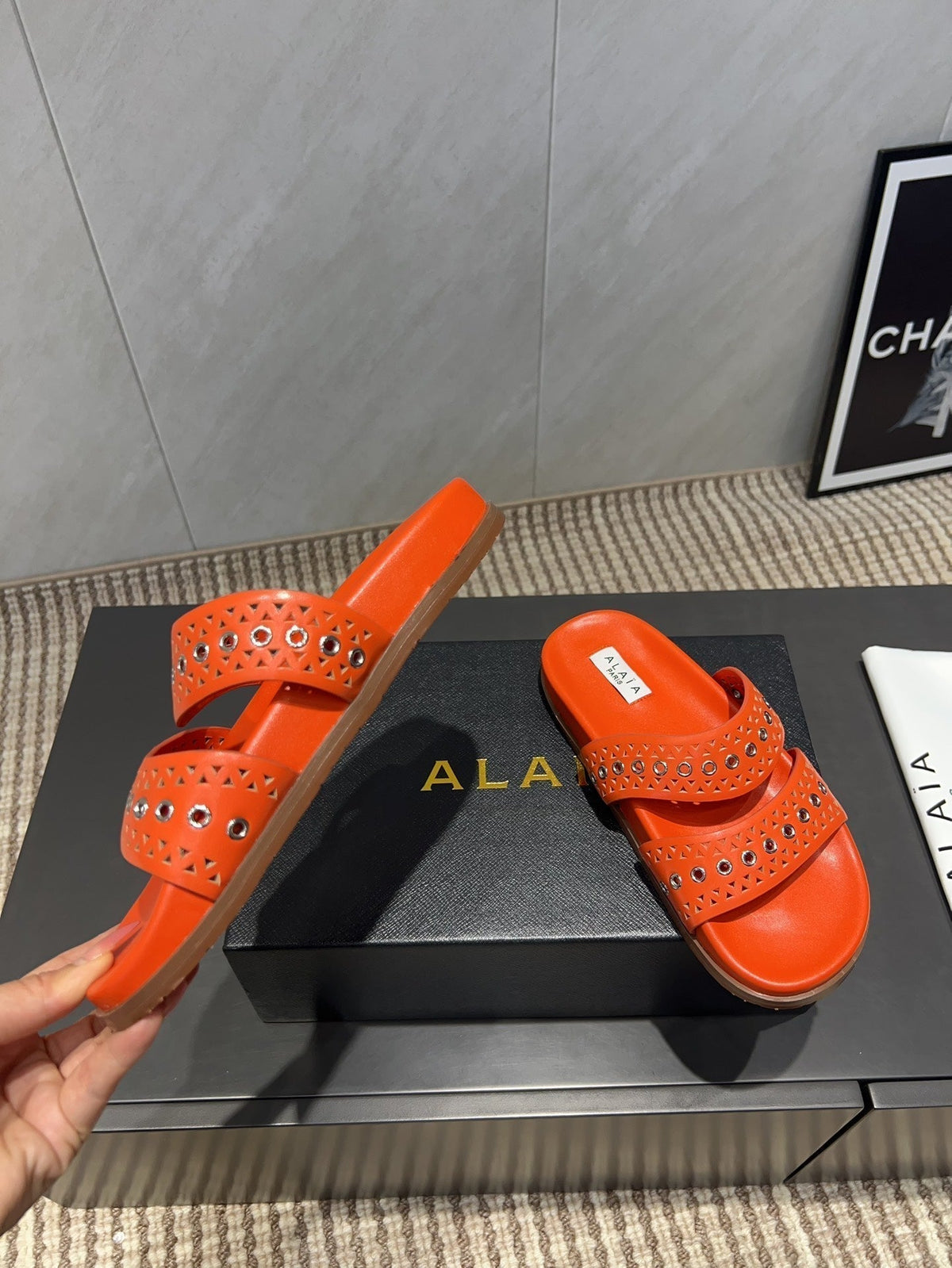 ALAIA DOUBLE-STRAP SANDALS 25S IN ORANGE CALFSKIN