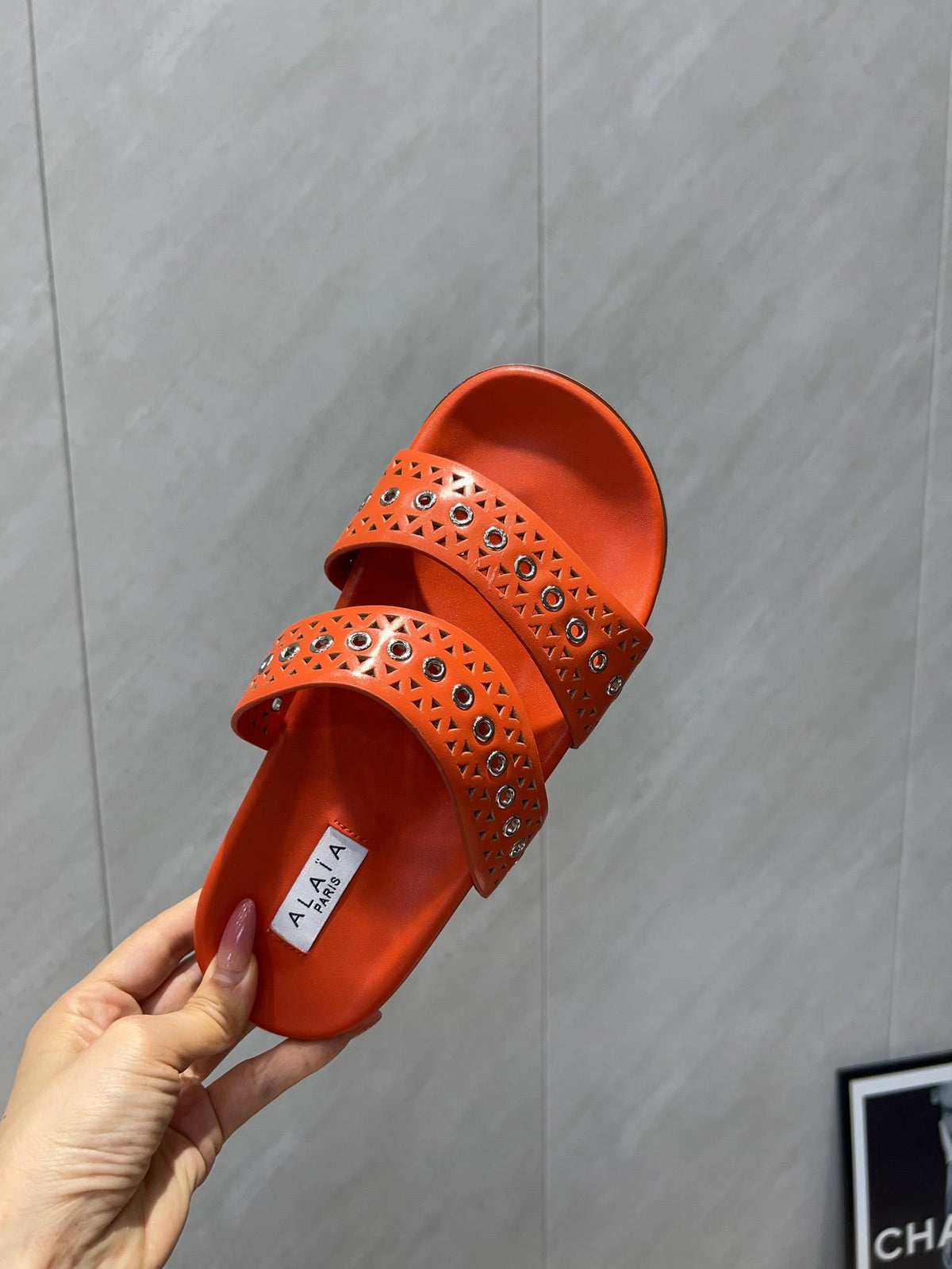 ALAIA DOUBLE-STRAP SANDALS 25S IN ORANGE CALFSKIN