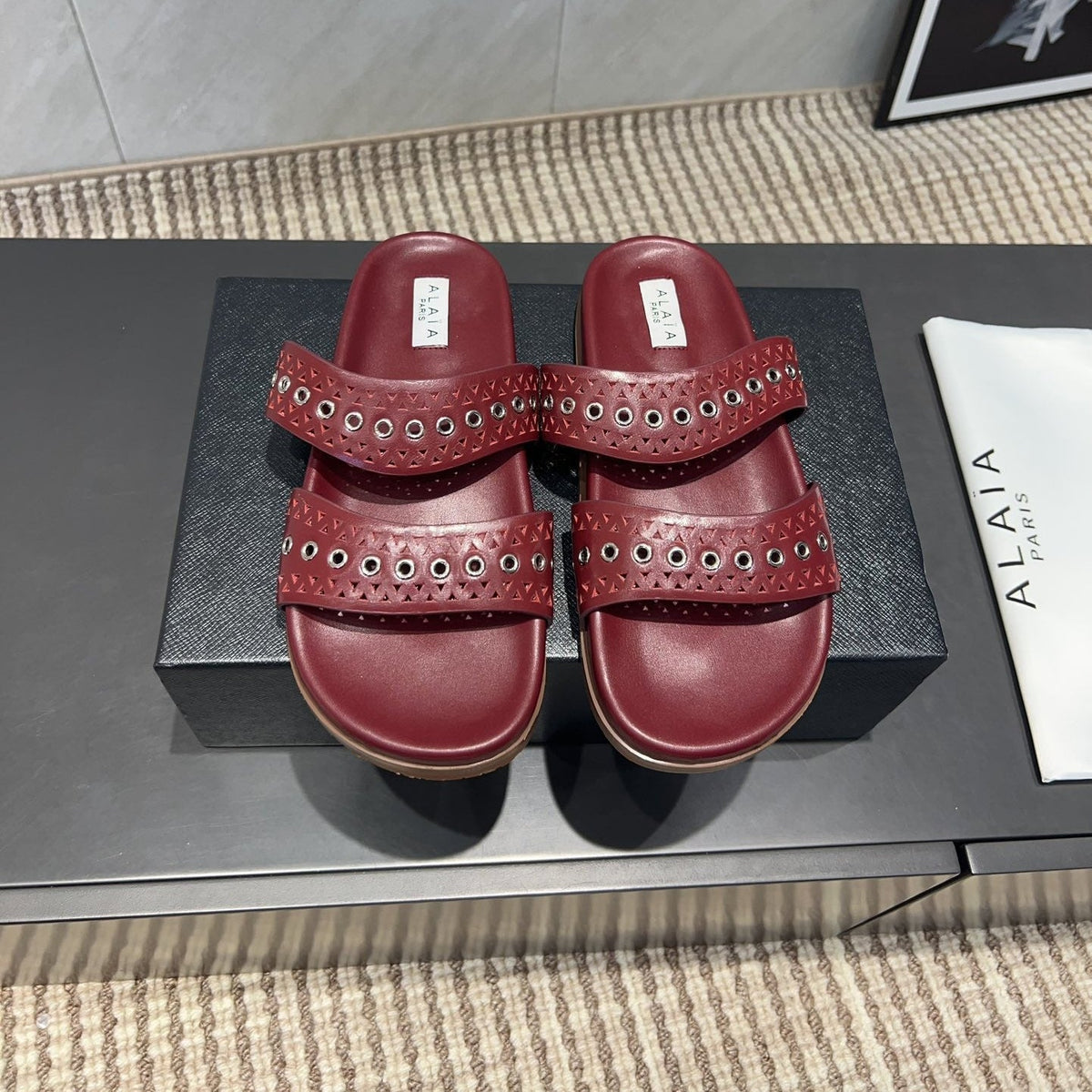 ALAIA DOUBLE-STRAP SANDALS 25S IN DARK RED CALFSKIN