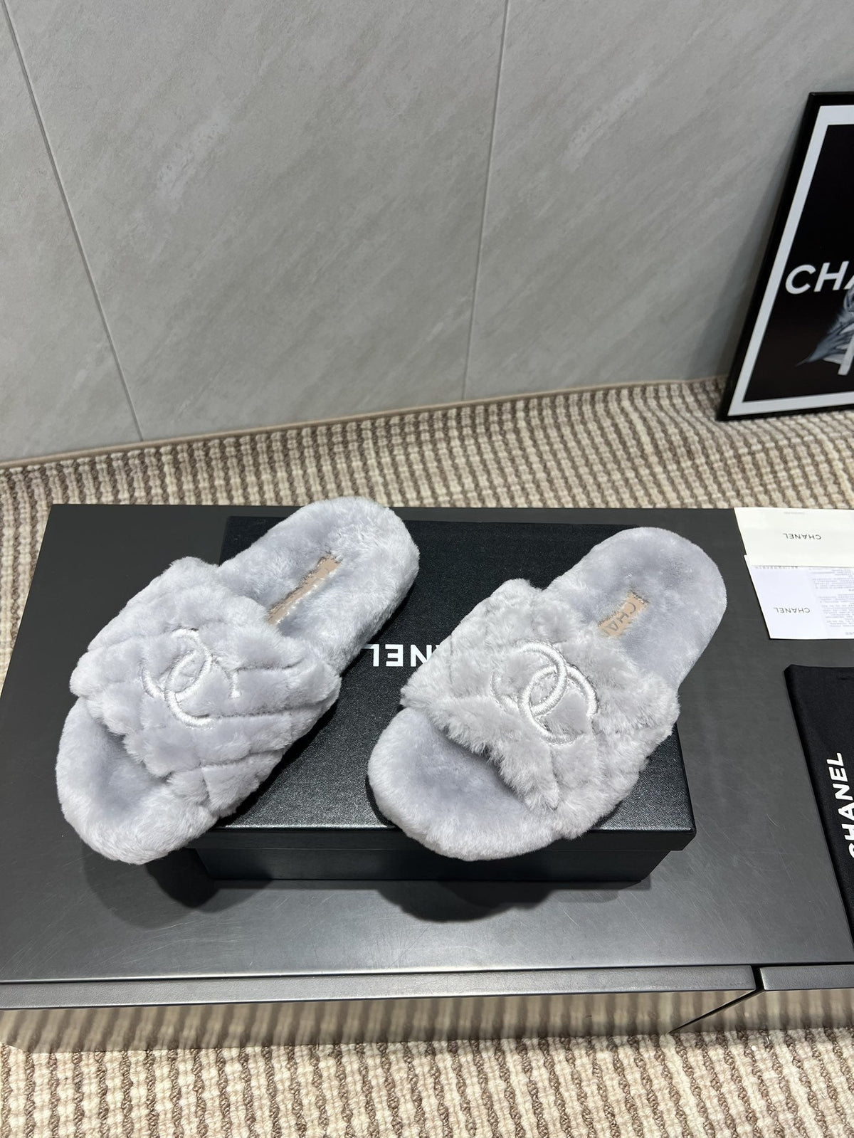 CHANEL 25S SLIPPERS IN LIGHT GRAY FUR