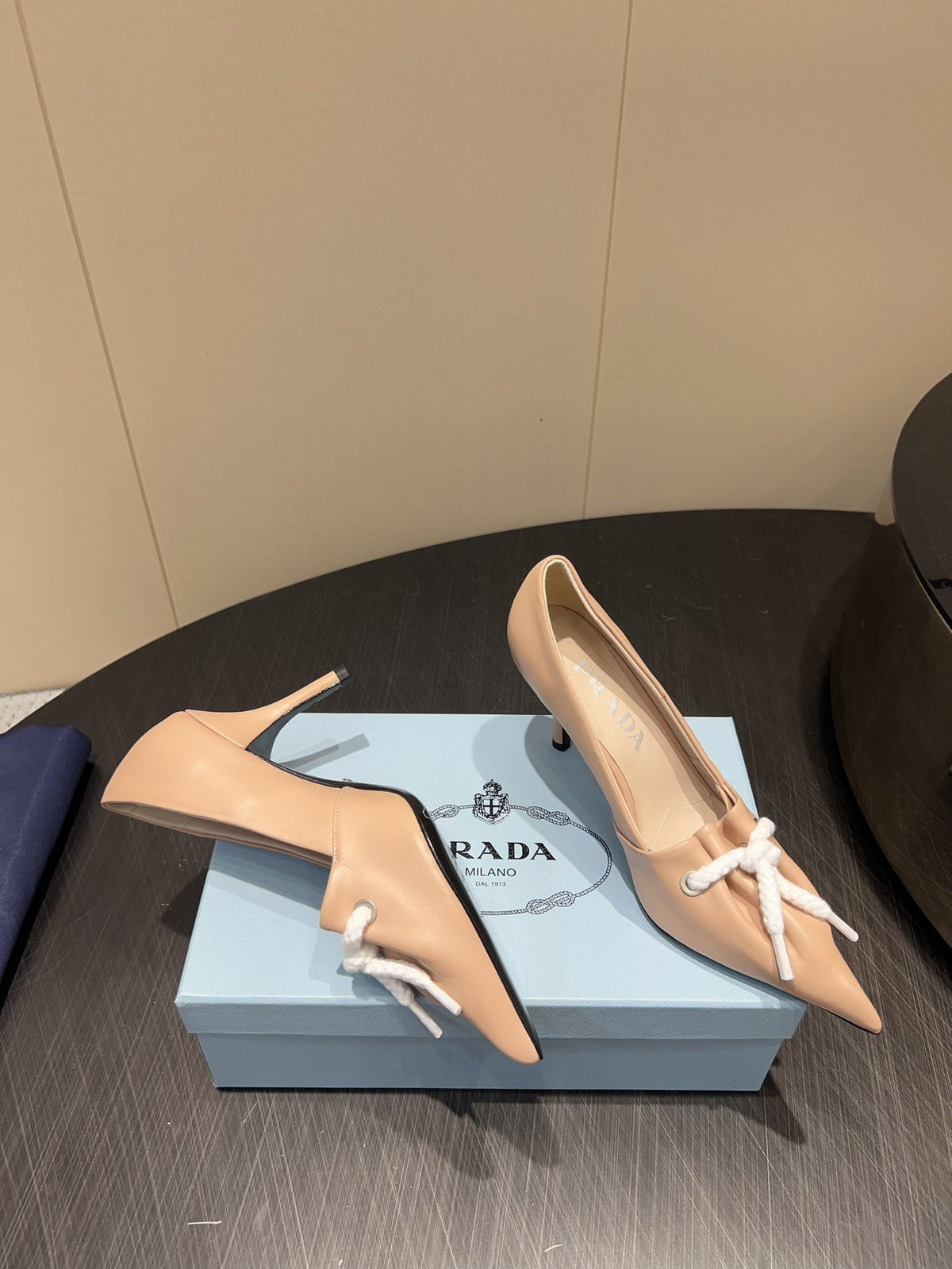 PRADA 25S POINTED TOE HIGH HEELS 85MM IN BEIGE LAMBSKIN WITH TIE UP DESIGN