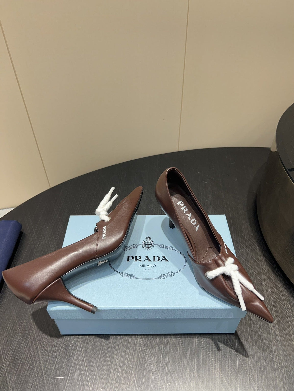 PRADA 25S POINTED TOE HIGH HEELS 85MM IN DARK BROWN LAMBSKIN WITH TIE UP DESIGN