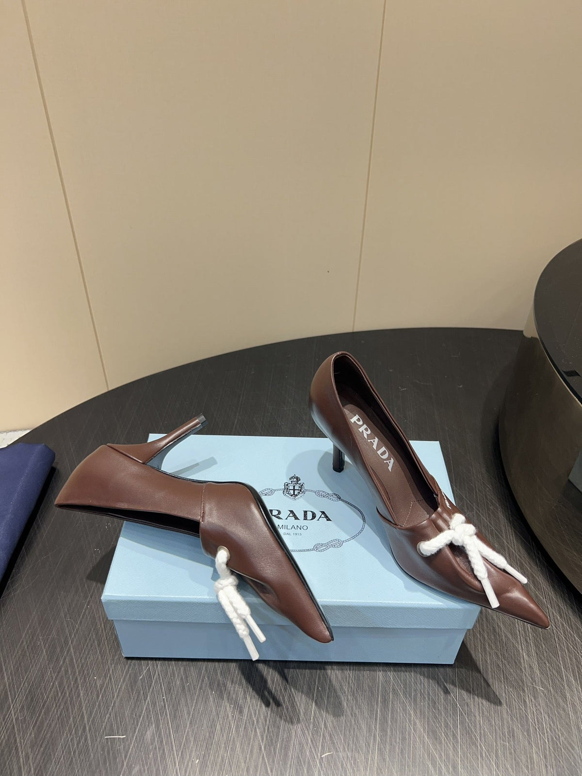 PRADA 25S POINTED TOE HIGH HEELS 85MM IN DARK BROWN LAMBSKIN WITH TIE UP DESIGN