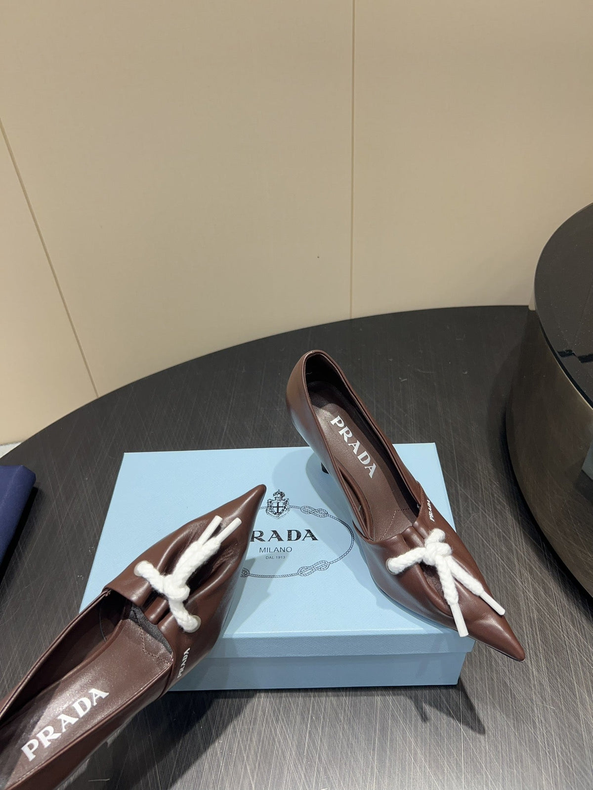 PRADA 25S POINTED TOE HIGH HEELS 85MM IN DARK BROWN LAMBSKIN WITH TIE UP DESIGN