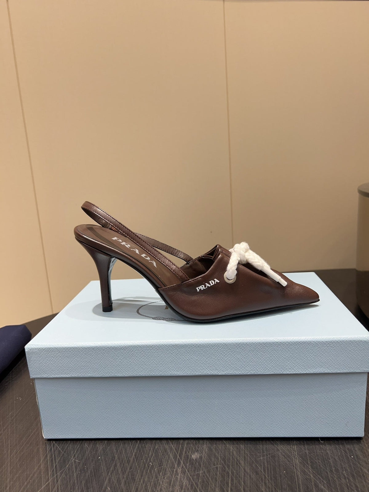 PRADA 25S POINTED TOE SLINGBACK 85MM IN DARK BROWN LAMBSKIN WITH TIE UP DESIGN
