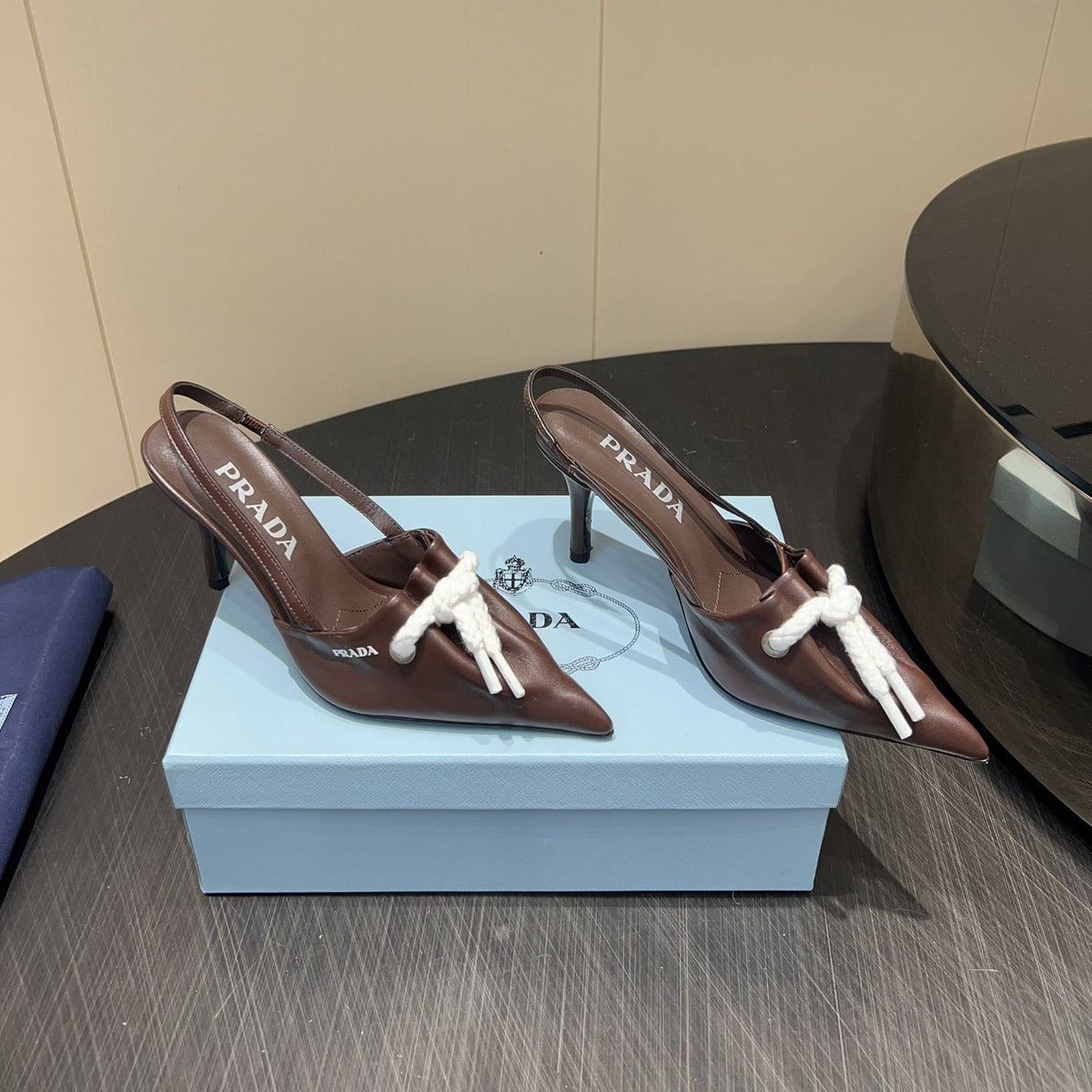 PRADA 25S POINTED TOE SLINGBACK 85MM IN DARK BROWN LAMBSKIN WITH TIE UP DESIGN
