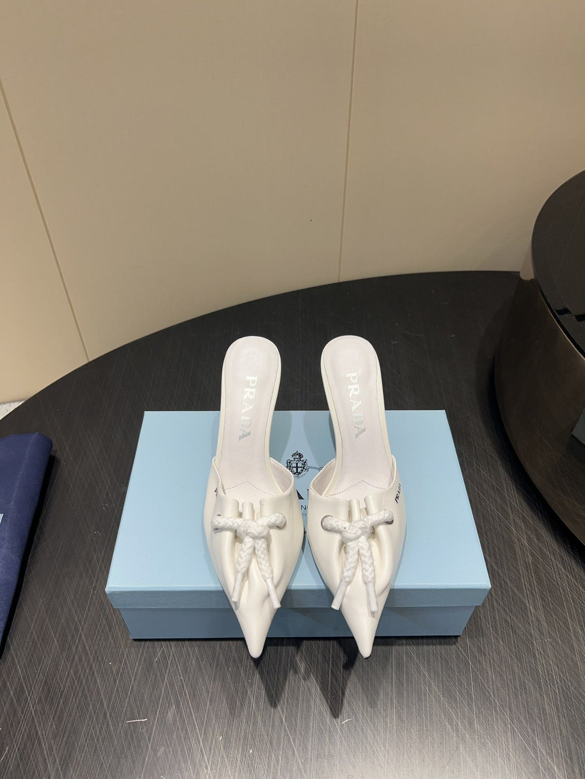 PRADA 25S BRAIDED DETAIL MULES 85MM IN WHITE CALFSKIN