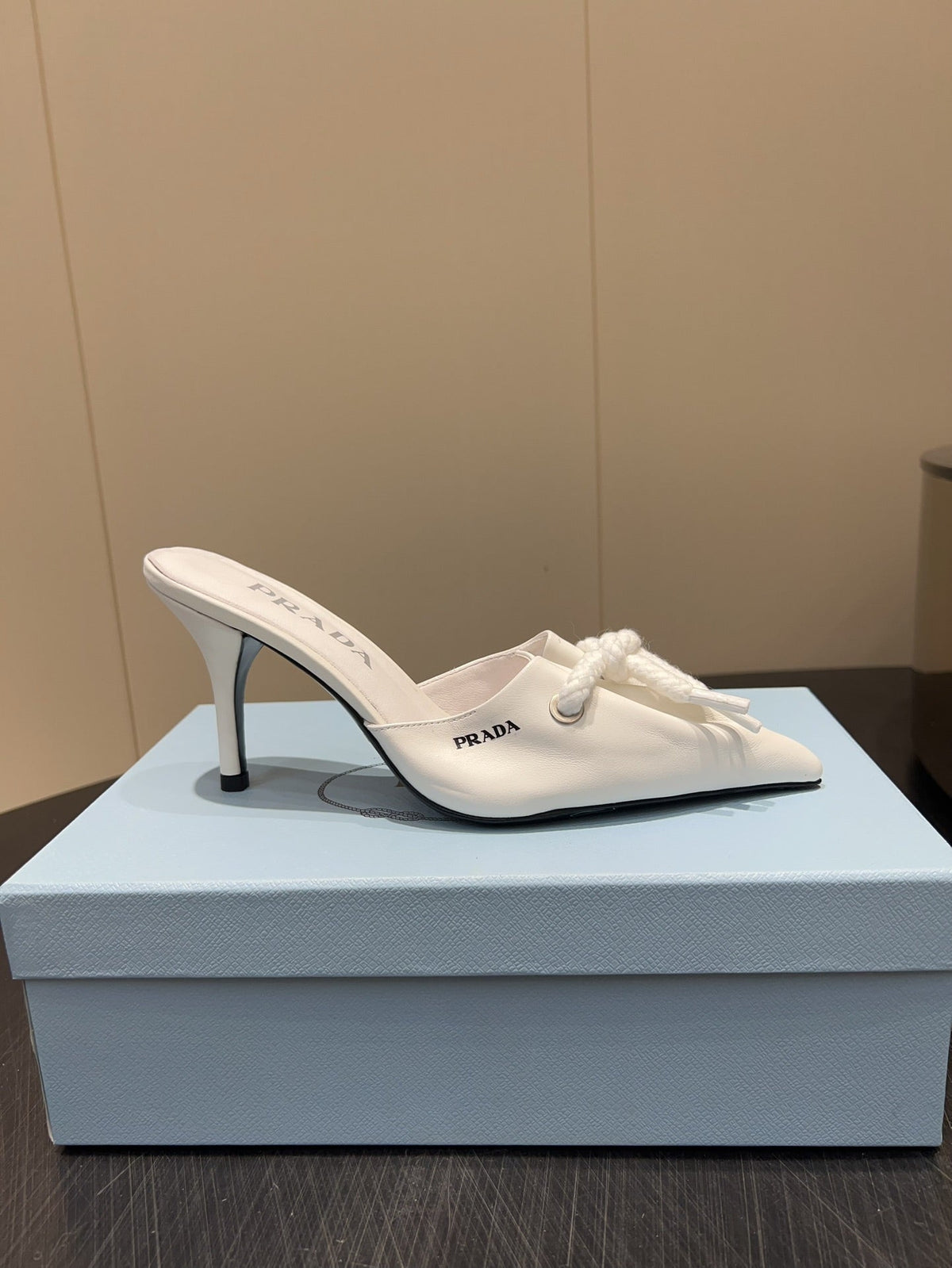 PRADA 25S BRAIDED DETAIL MULES 85MM IN WHITE CALFSKIN