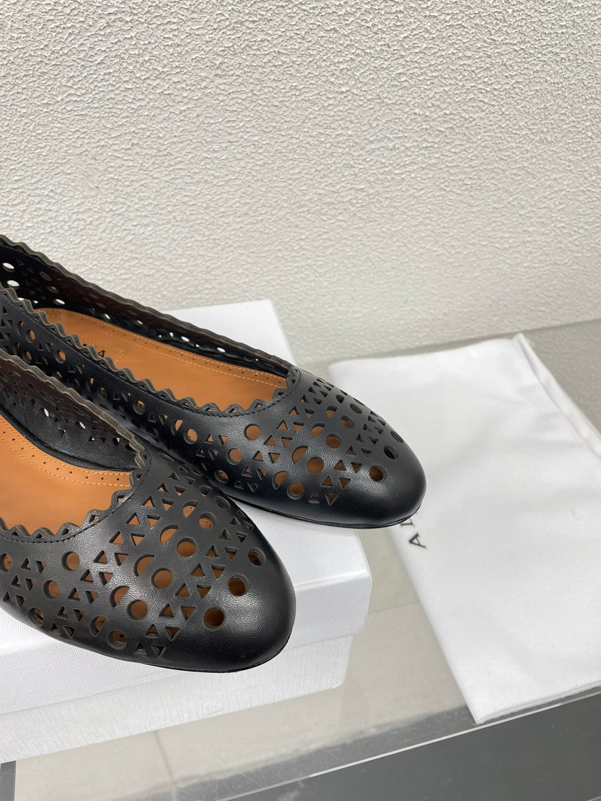 ALAIA BALLET FLAT IN BLACK MESH LAMBSKIN