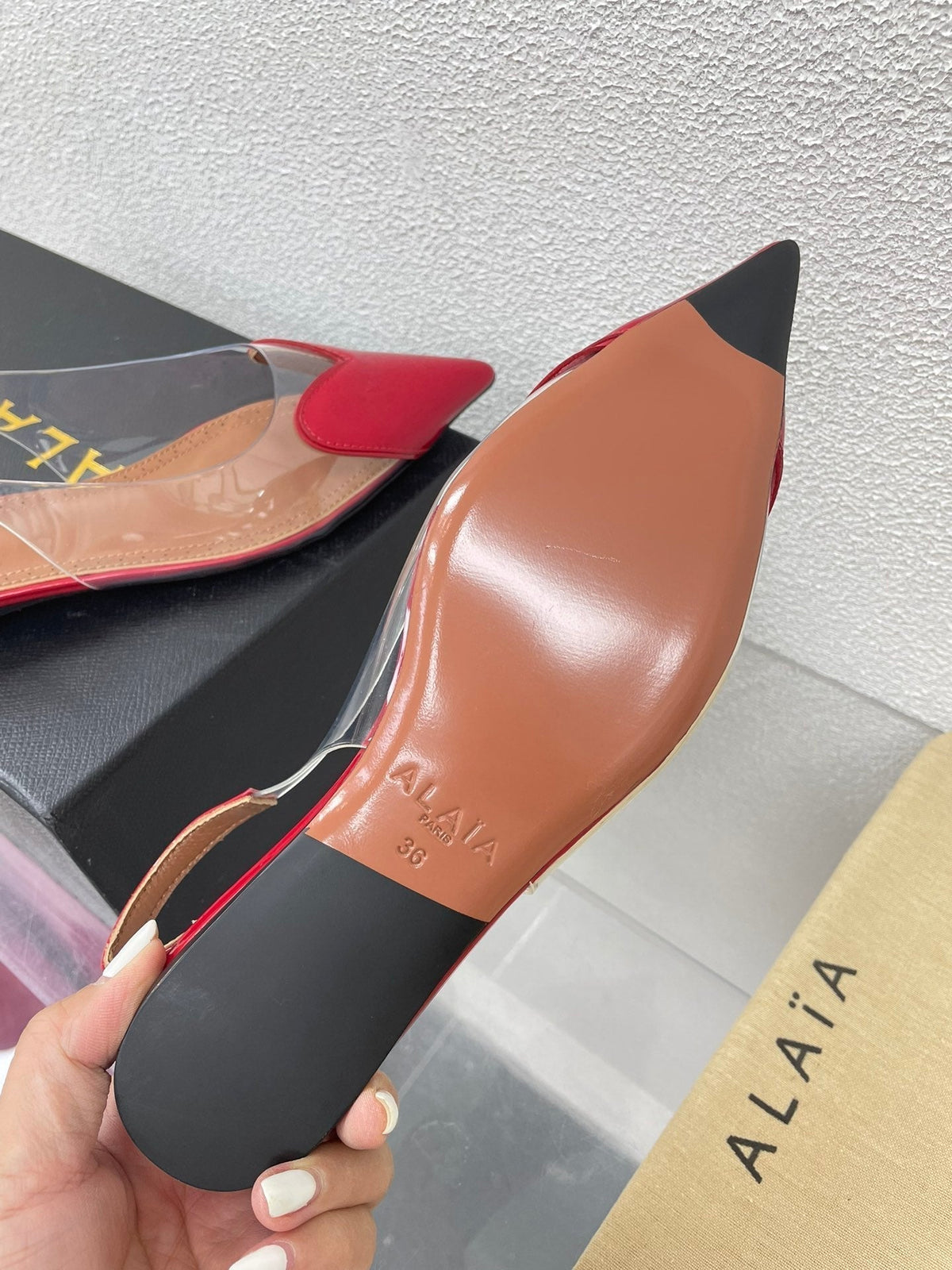 ALAIA LE COEUR FLAT SLINGBACKS IN CHERRY RED PATENT LAMBSKIN