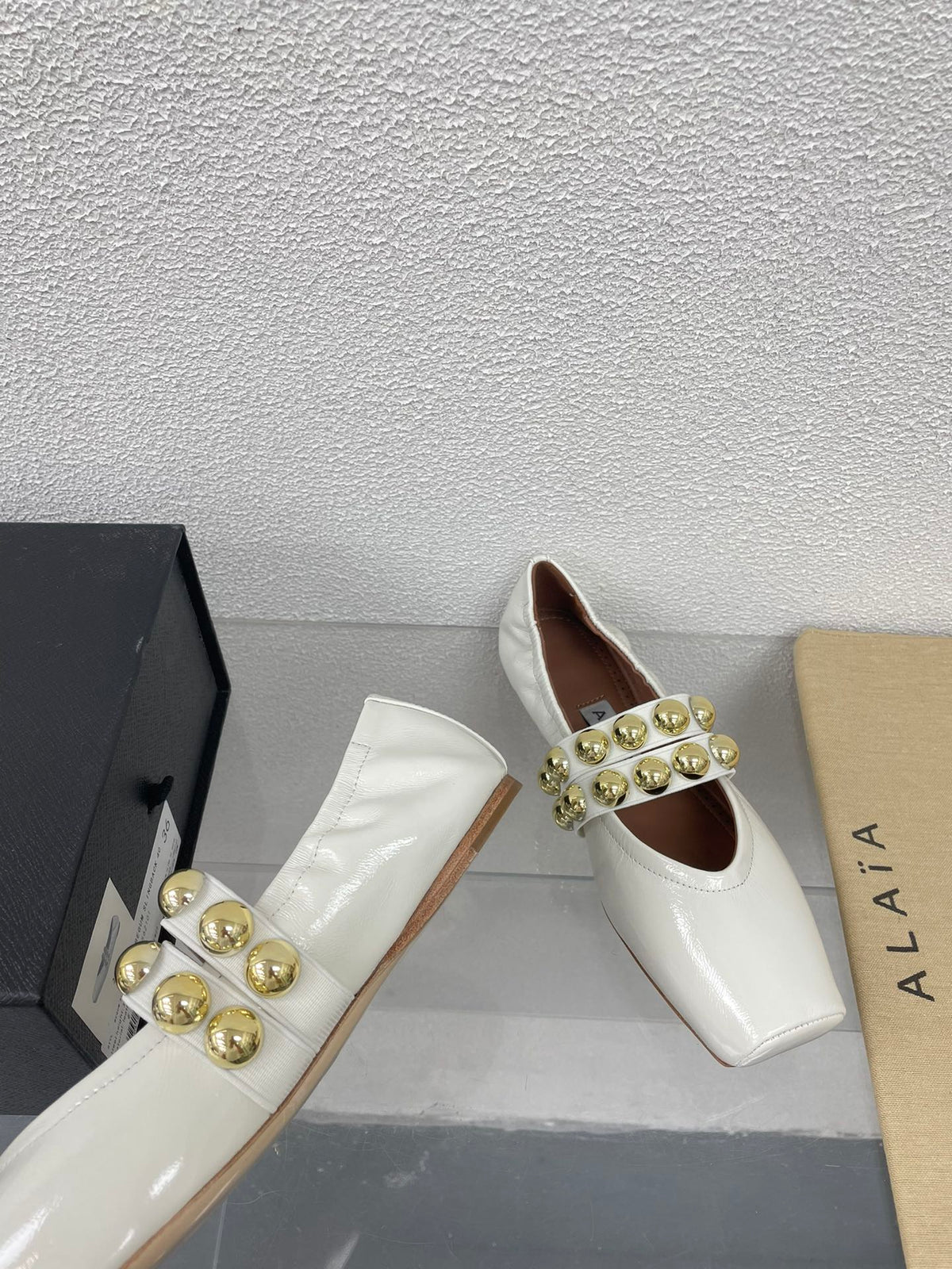 ALAIA MARY JANE PEARL IN GLOSSY WHITE LAMBSKIN