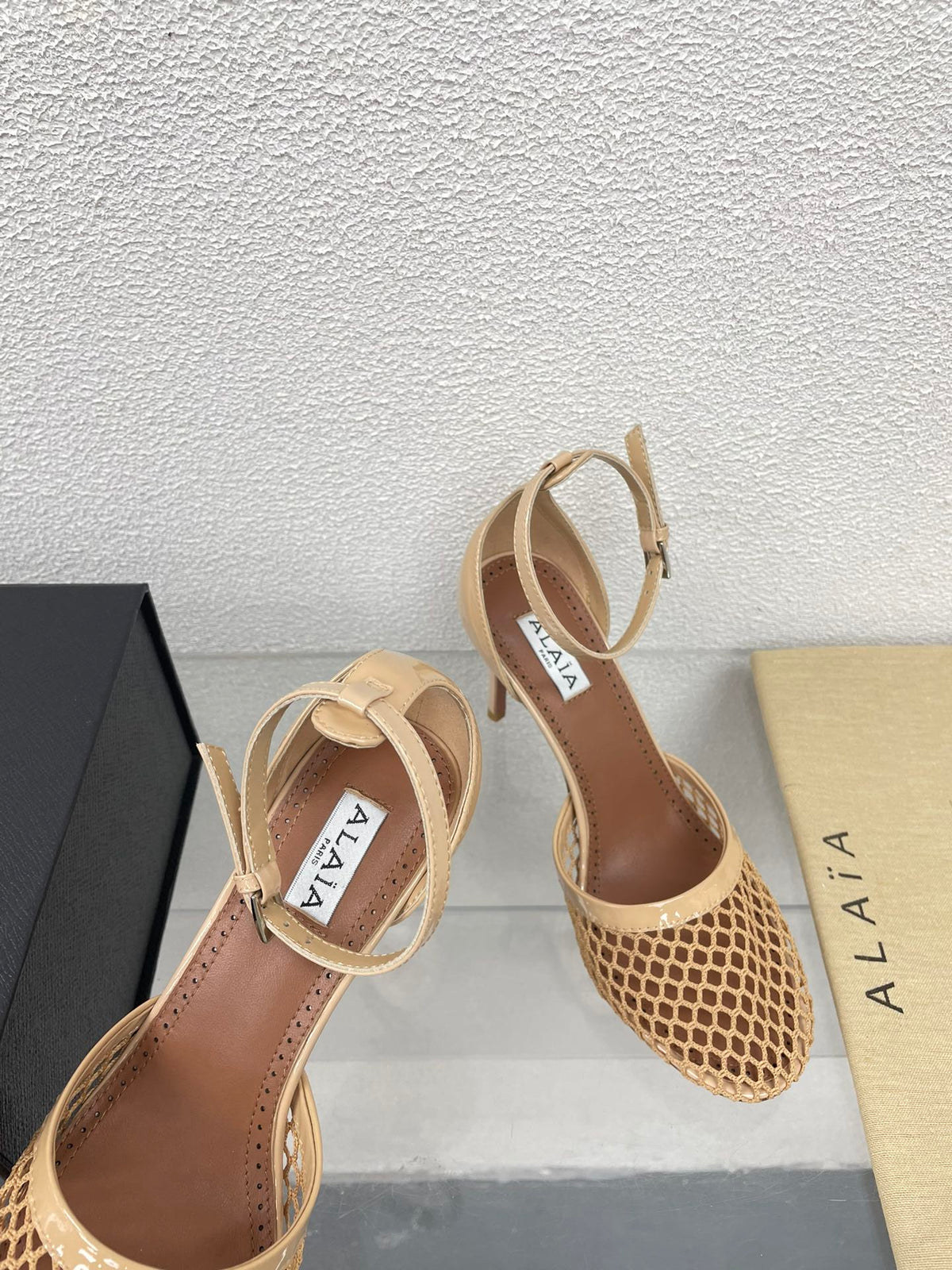 ALAIA HIGH FISHNET 9 CM PUMPS IN EGG NOG MESH
