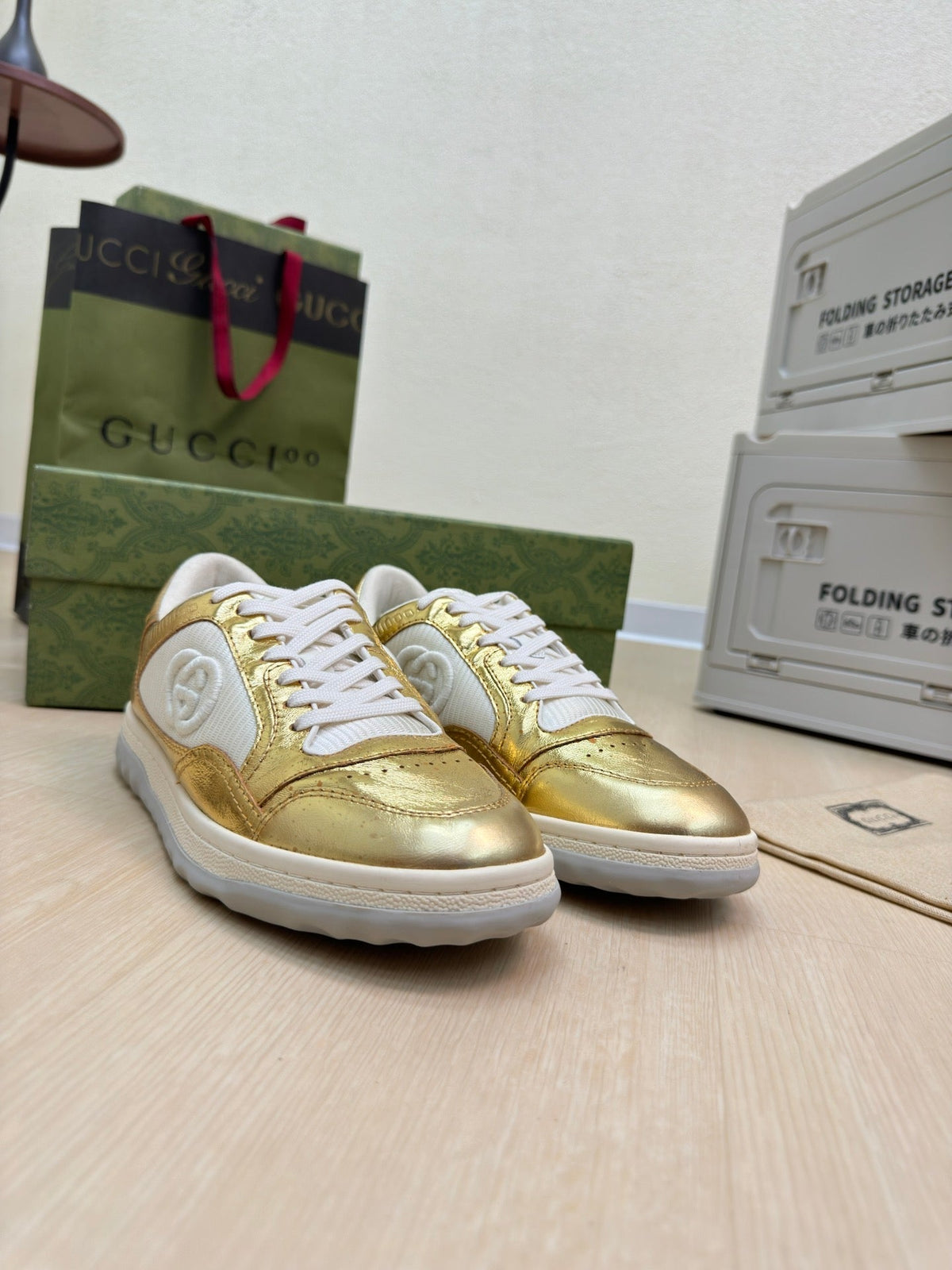 GG INTERLOCKING G SNEAKER GOLD CALFSKIN AND FABRIC