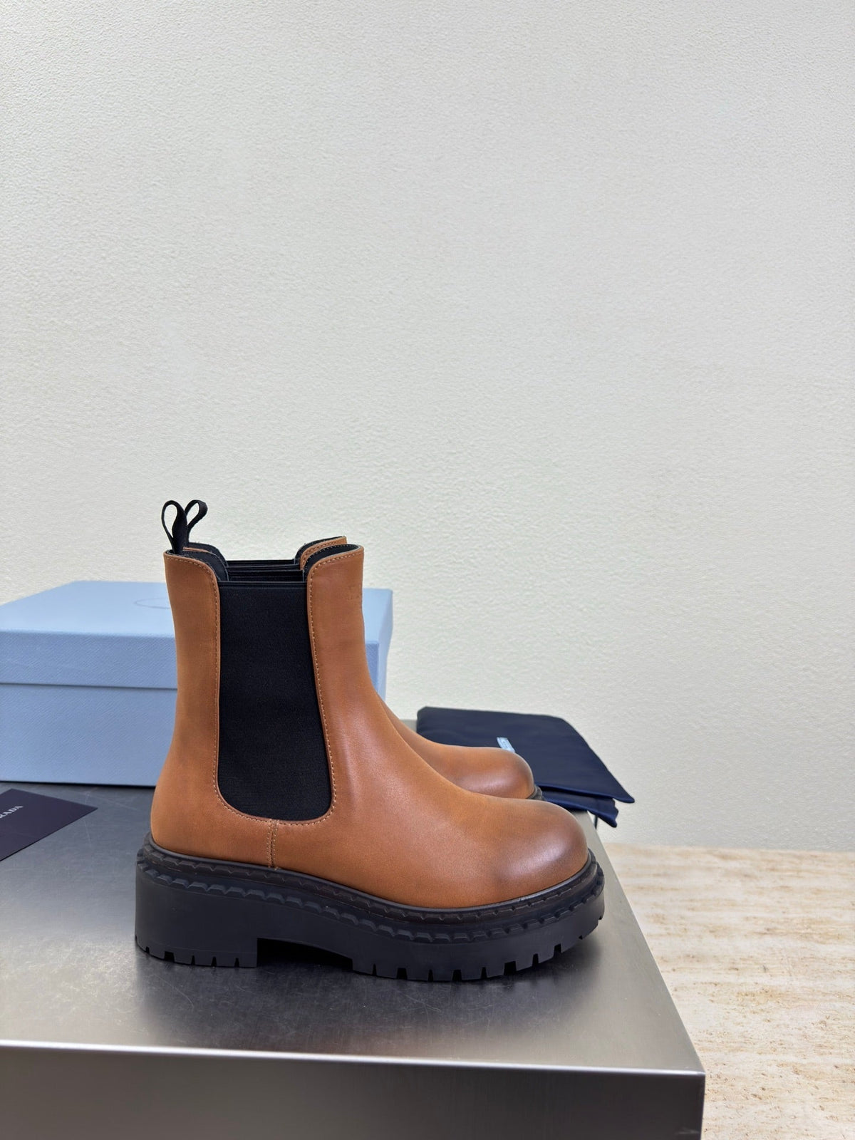 PRADA 25S PLATFORM CHELSEA BOOTS IN BROWN CALFSKIN