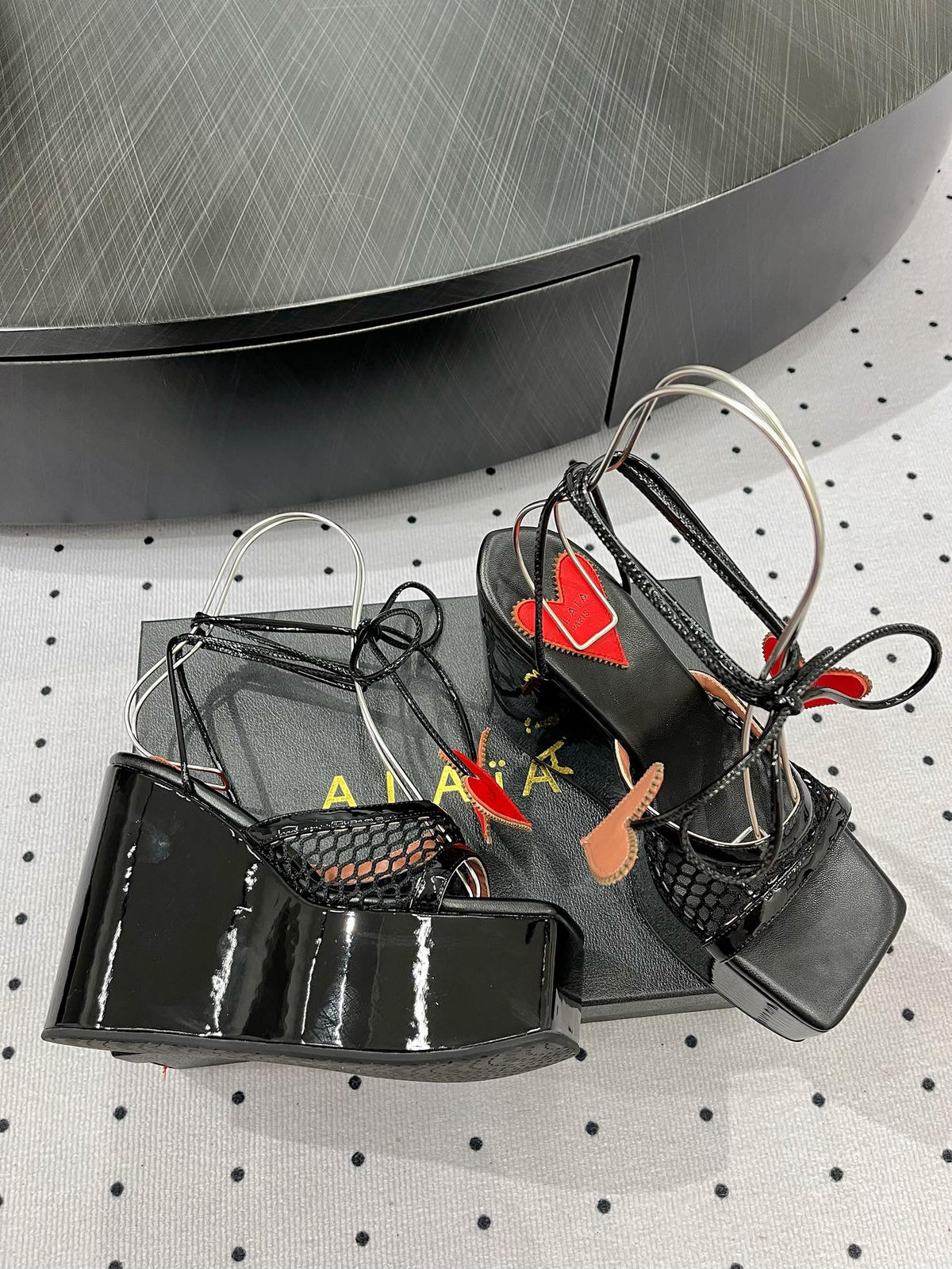 ALAIA BANQUET WEDGE SANDALS IN BLACK LAMBSKIN WITH RED HEART