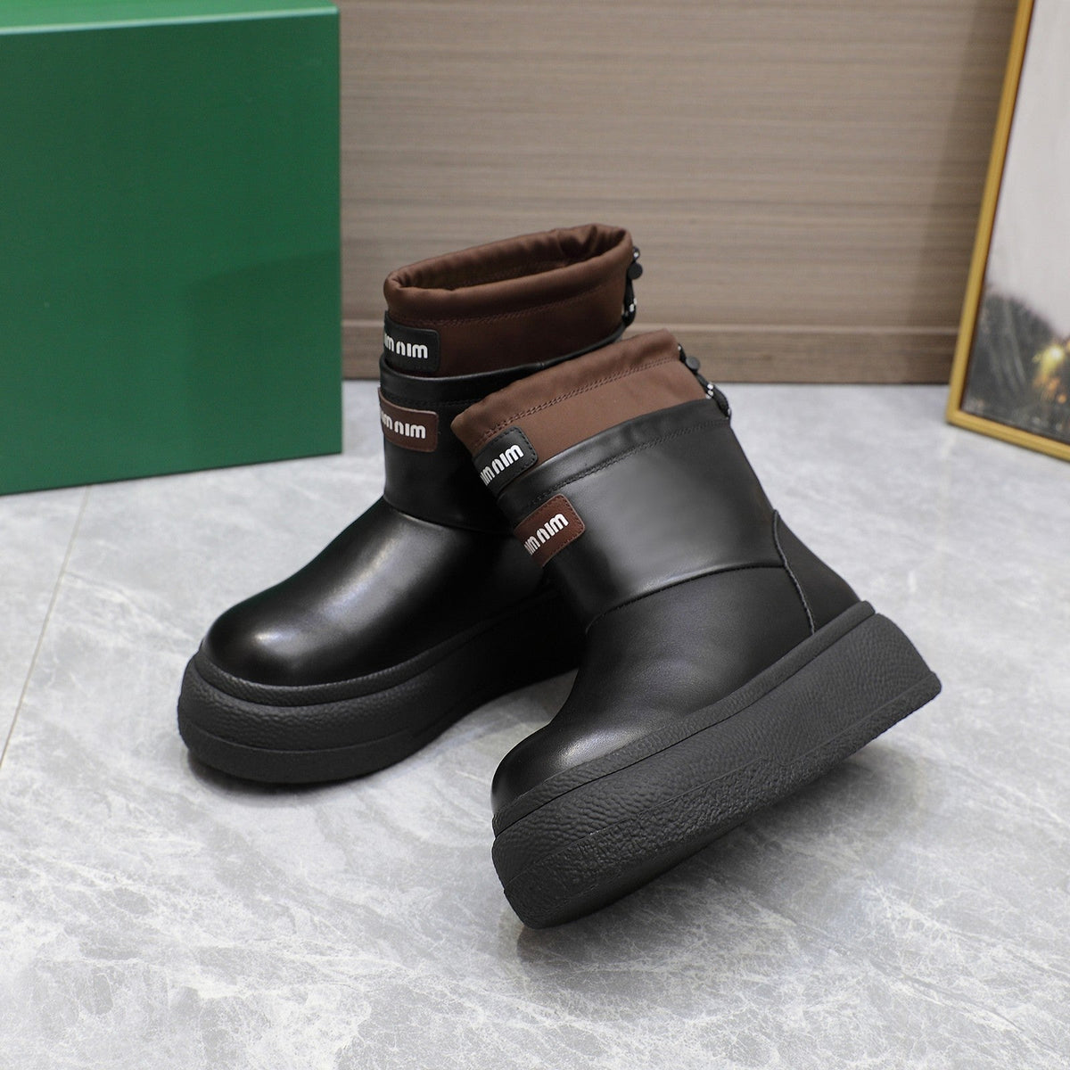 THICK-SOLED SNOW BOOTS IN BLACK CALFSKIN MIX CHOCOLATE NYLON