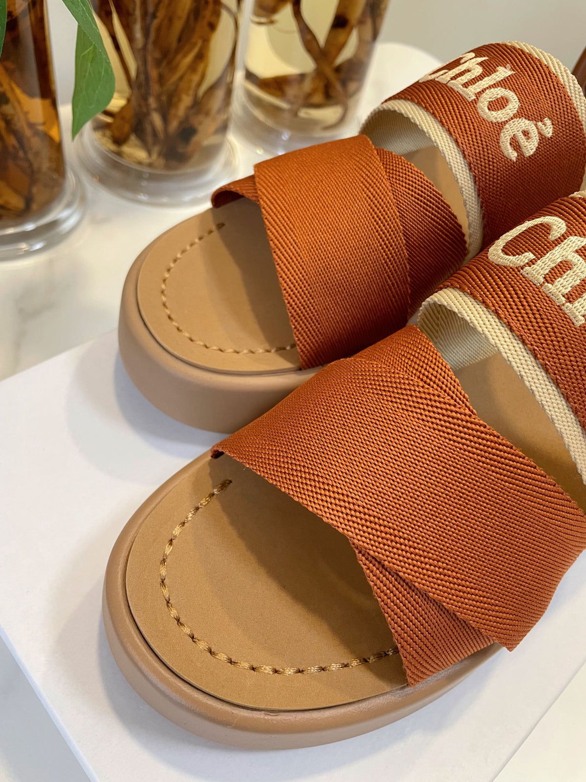 CHLOÉ WOODY WEDGE SANDALS IN BRONZE BROWN CANVAS WITH CIDER BROWN RUBBER SOLE