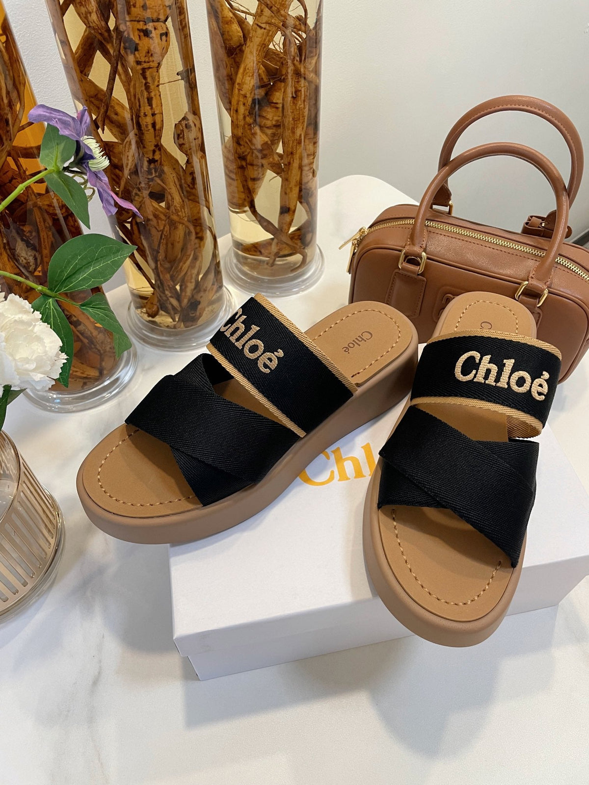 CHLOÉ WOODY WEDGE SANDALS IN BLACK CANVAS WITH CIDER BROWN RUBBER SOLE