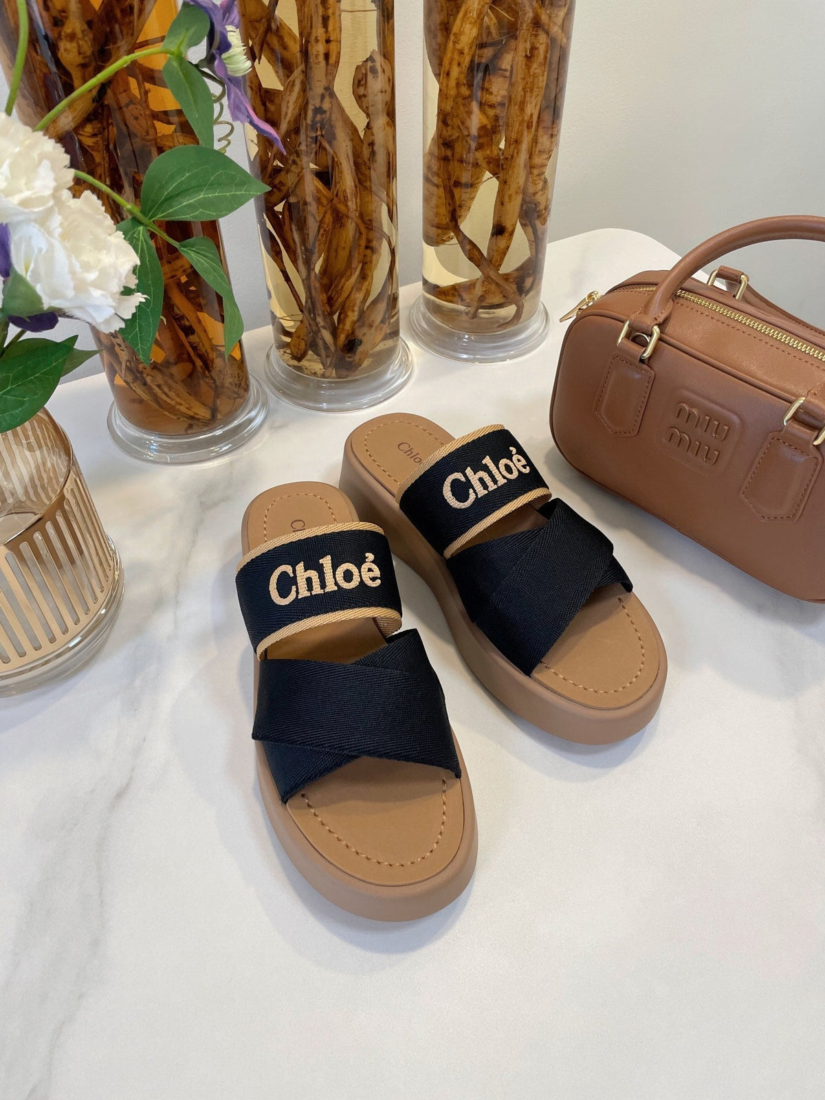 CHLOÉ WOODY WEDGE SANDALS IN BLACK CANVAS WITH CIDER BROWN RUBBER SOLE