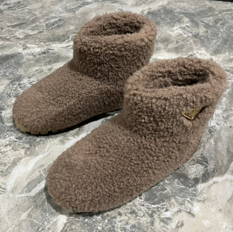 PRADA 26S ANKLE BOOTS IN DARK BROWN FUR