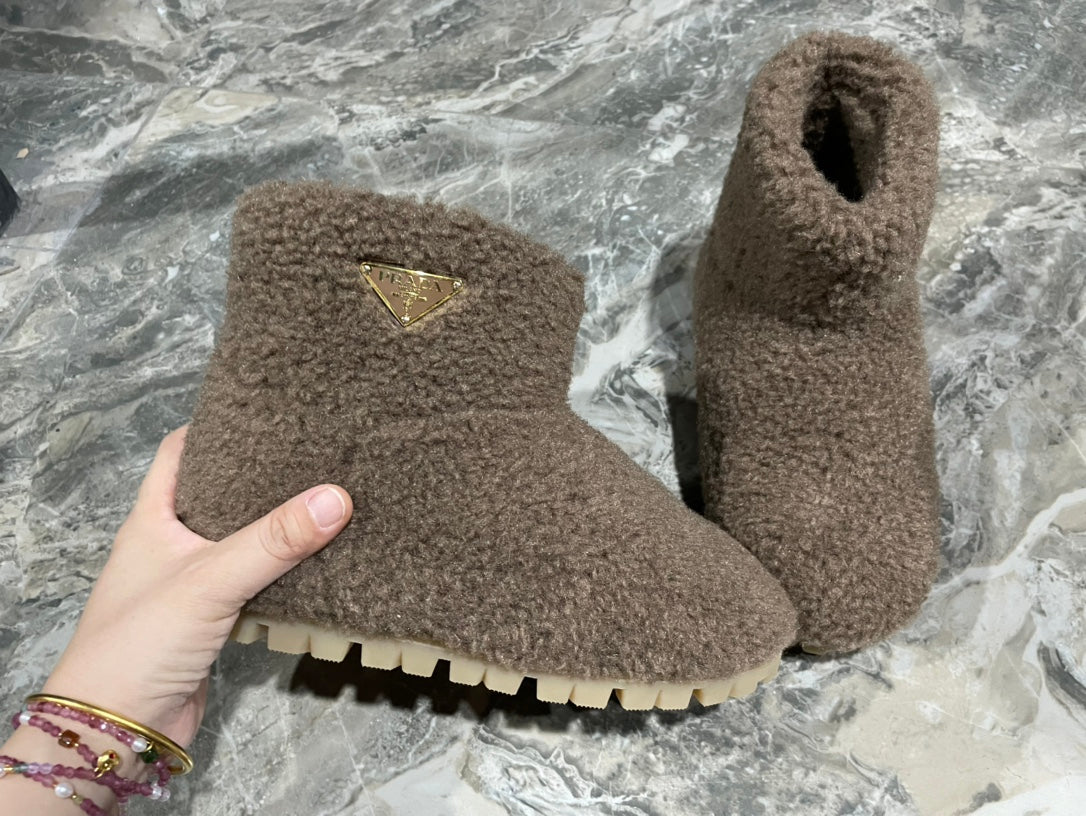 PRADA 26S ANKLE BOOTS IN DARK BROWN FUR