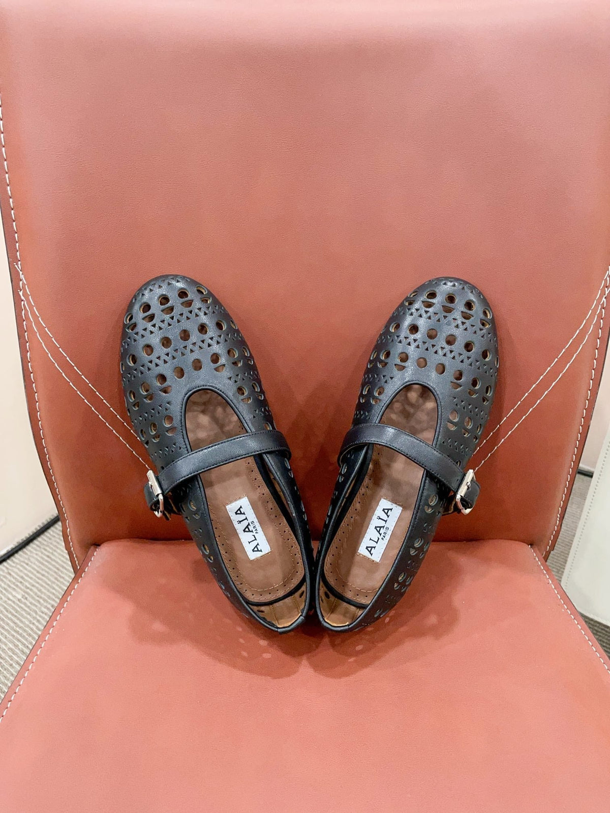 ALAIA HOLLOW BALLET FLAT IN BLACK LAMBSKIN