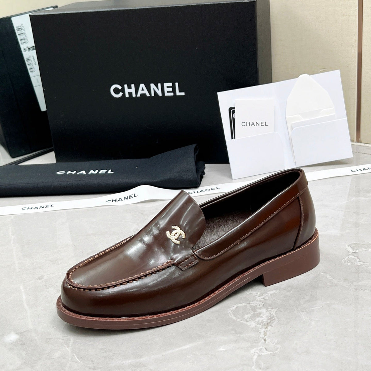 CC MOCCASINS IN BROWN CALFSKIN