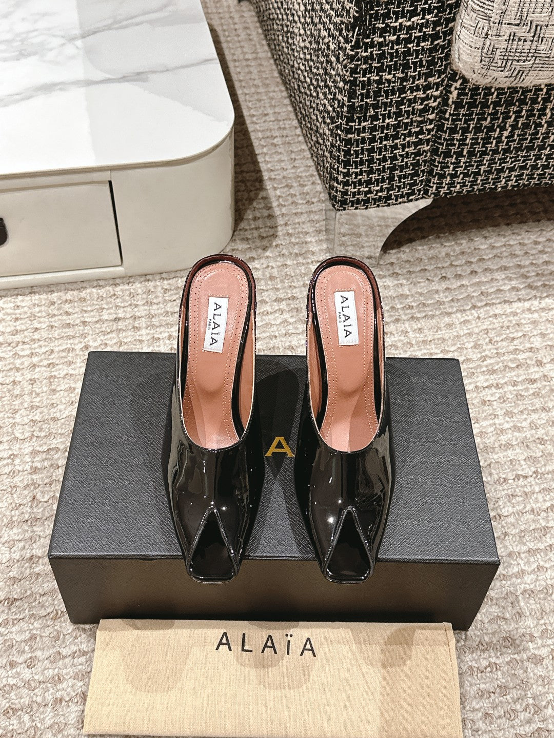 ALAIA SPIKE JEWEL MULES IN BLACK GLOSSY CALFSKIN