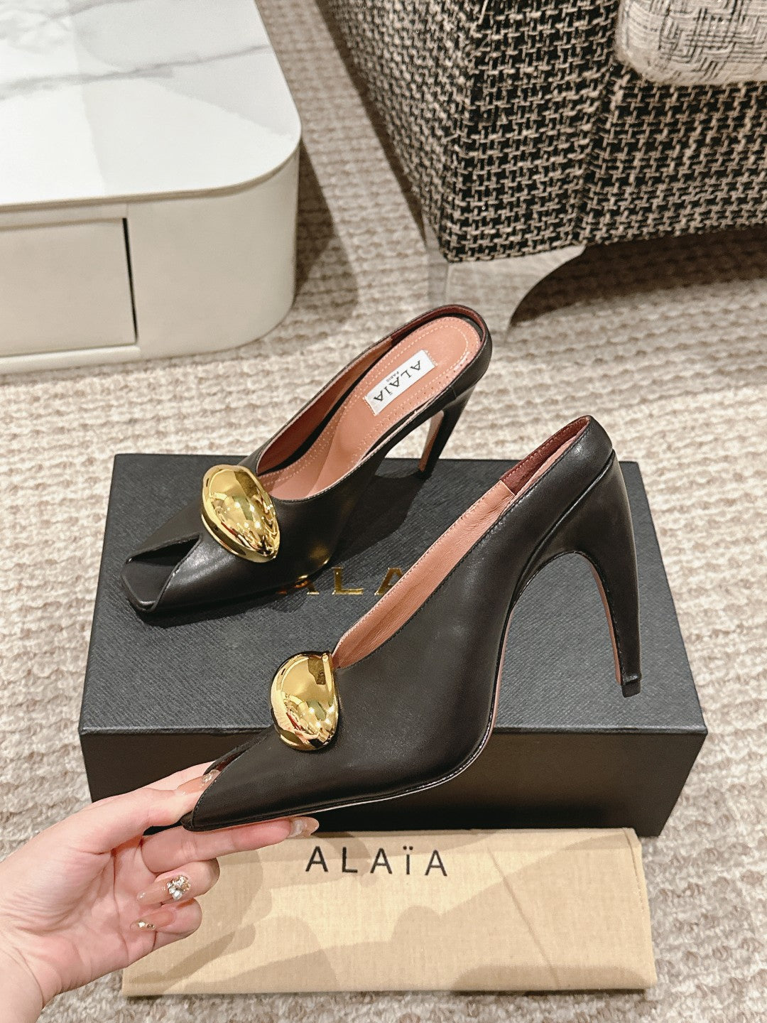 ALAIA SPIKE JEWEL MULES IN BLACK CALFSKIN WITH GOLD HARDWARE