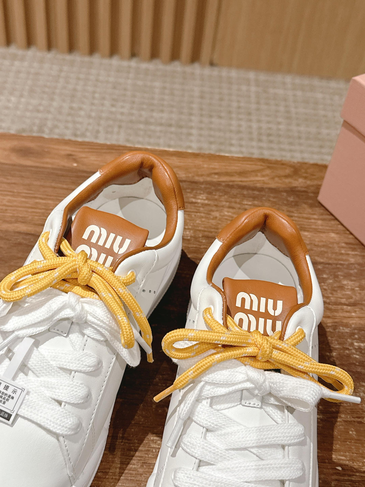 MM SNEAKERS IN WHITE CALFSKIN WITH YELLOW LACES