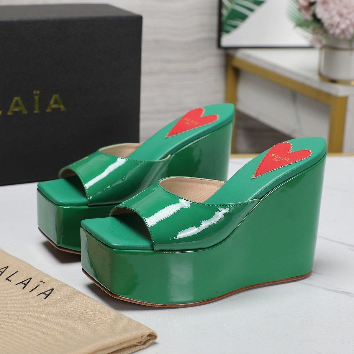 ALAIA PLATFORM WEDGE IN COOL GREEN LAMBSKIN WITH RED HEART