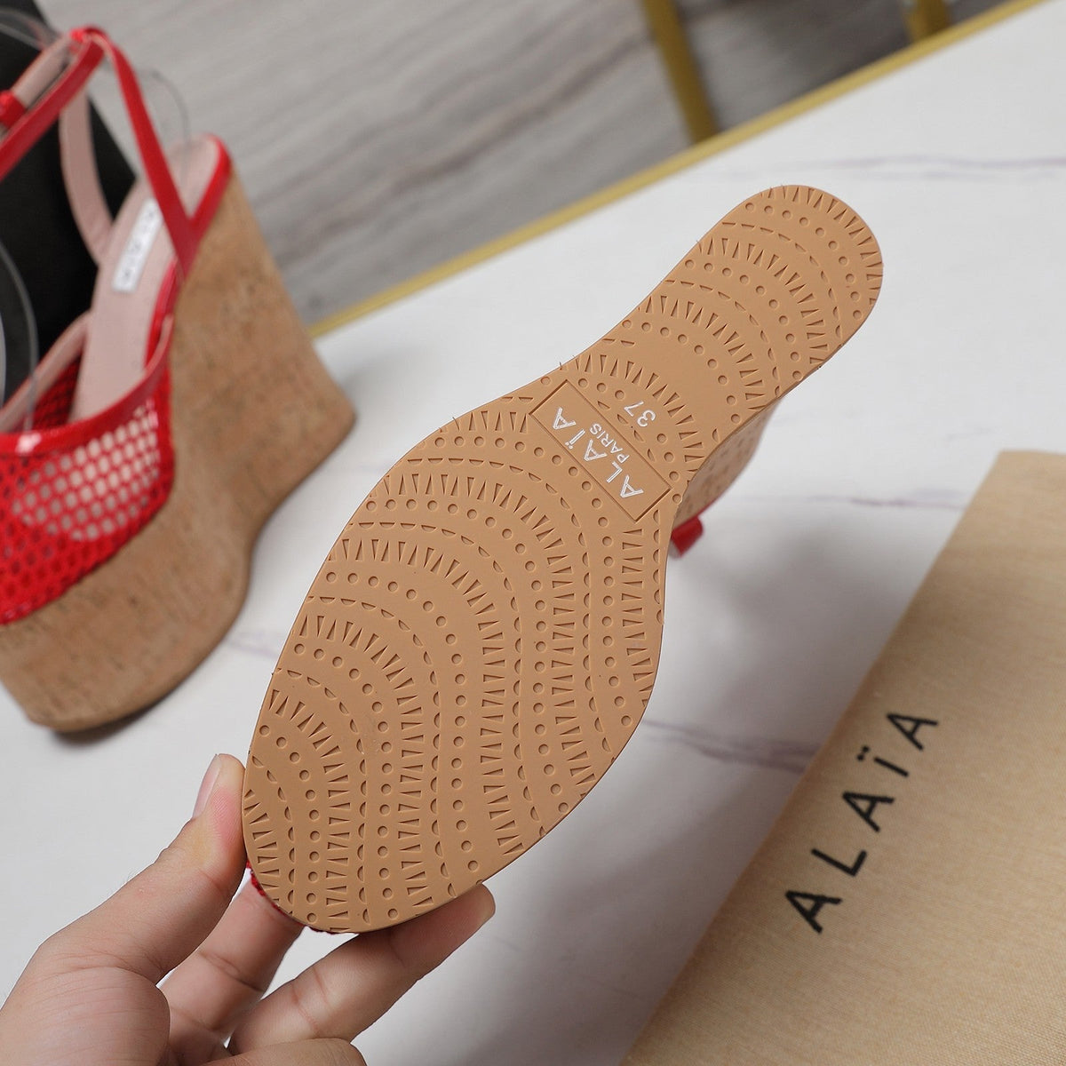 ALAIA WEDGE SANDAL IN CHERRY RED MESH AND BEIGE RUBBER