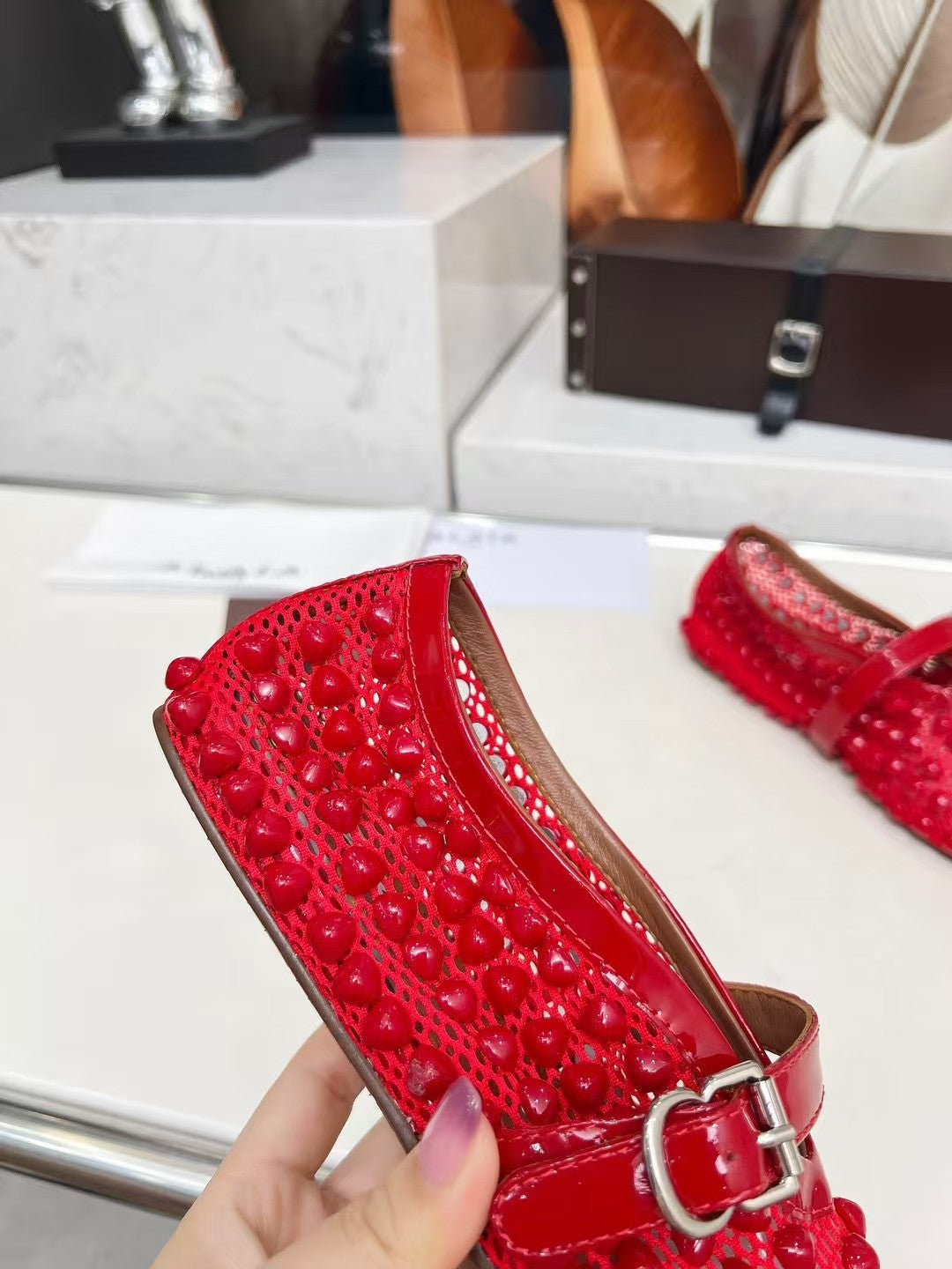 ALAIA MARY JANE SHOES IN CHERRY RED STUDDED FISHNET MESH AND CALFSKIN