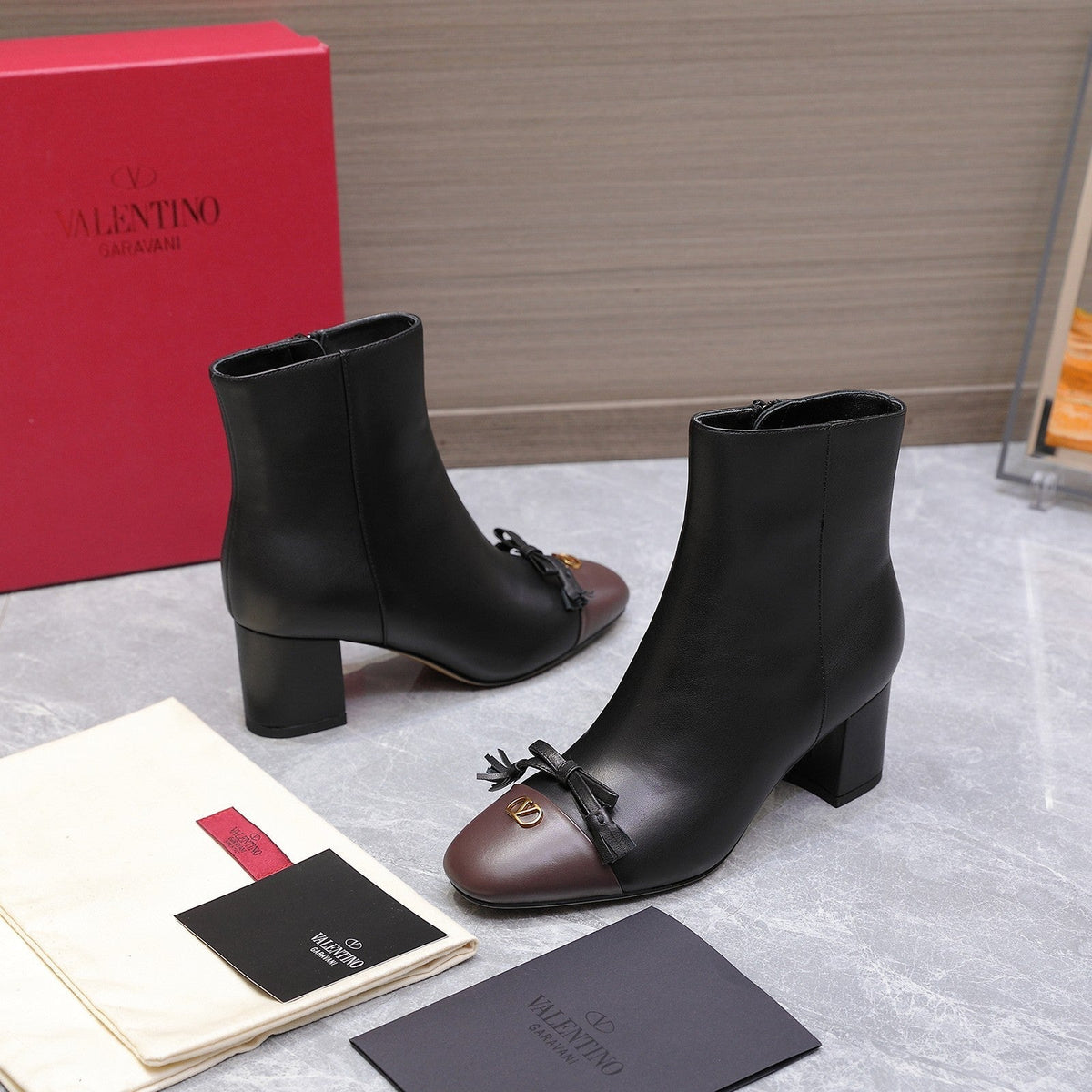 VALENTINO 25S VALET DU ROI ANKLE BOOTS 60 MM IN BLACK MIX DARK BROWN CALFSKIN WITH BOW