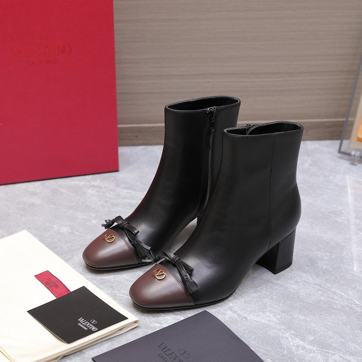 VALENTINO 25S VALET DU ROI ANKLE BOOTS 60 MM IN BLACK MIX DARK BROWN CALFSKIN WITH BOW