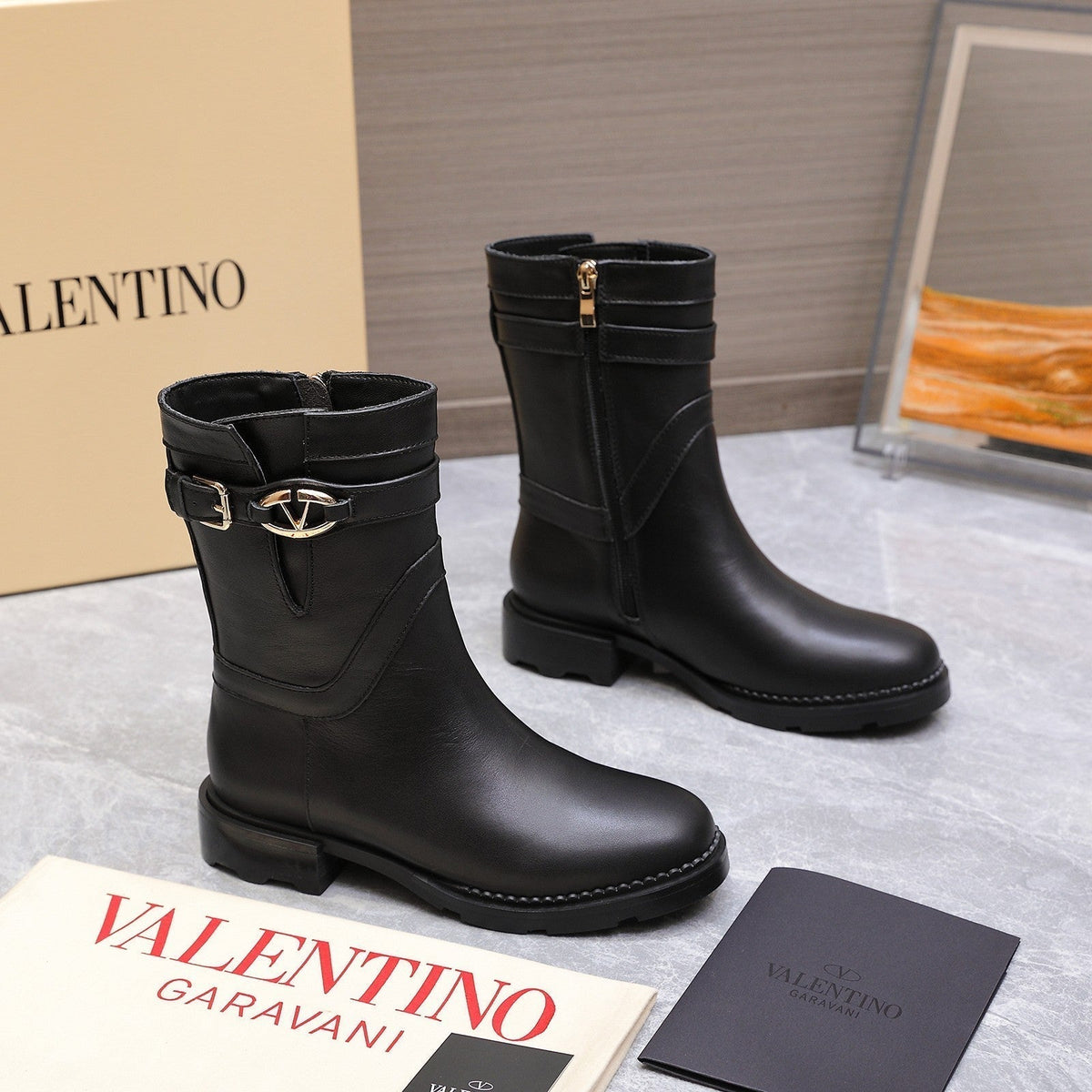 VALENTINO 25S FLAT ANKLE BOOTS IN BLACK CALFSKIN