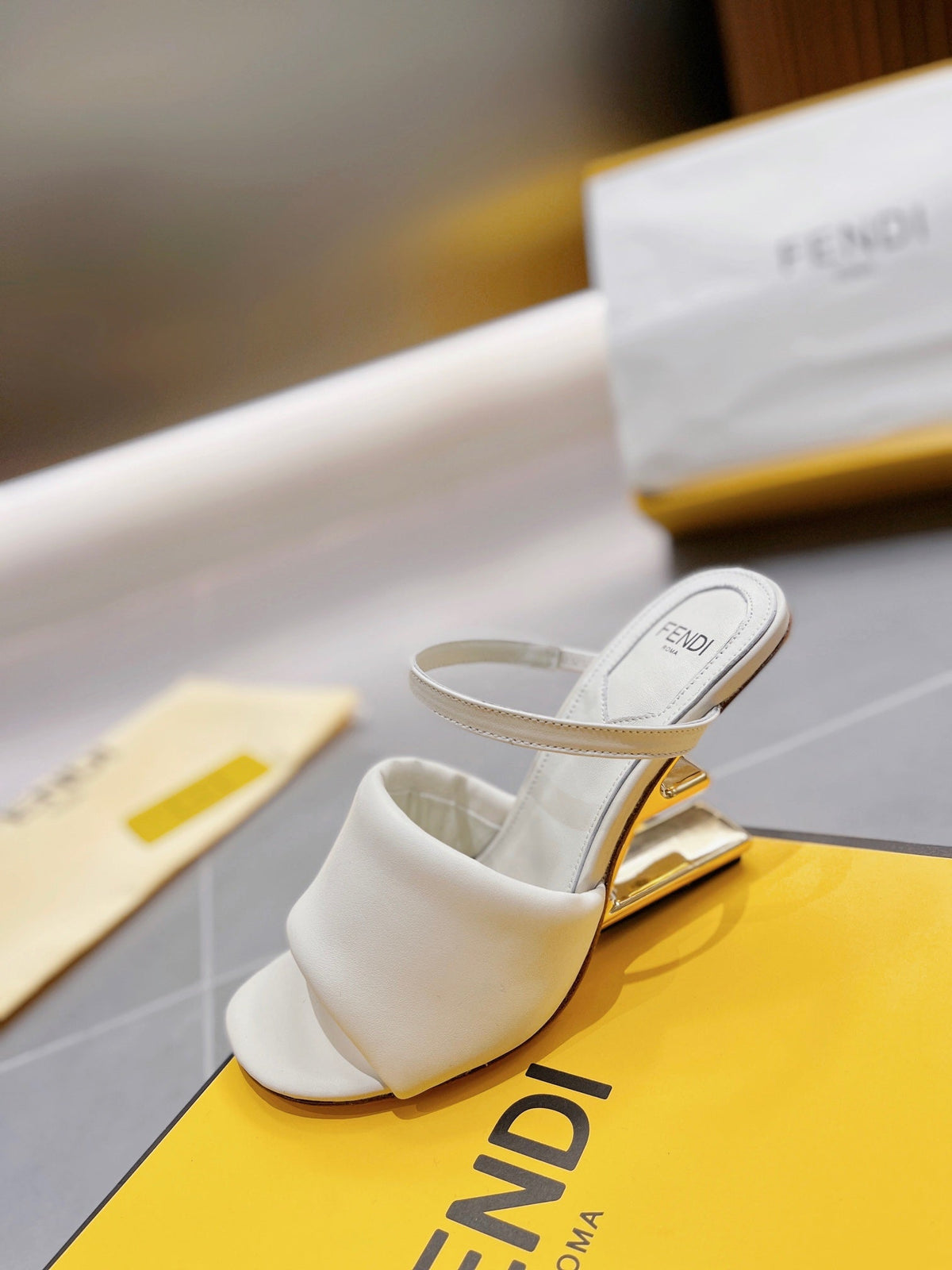 FENDI BAGUETTE HIGH-HEEL SANDALS 8 CM IN WHITE CALFSKIN