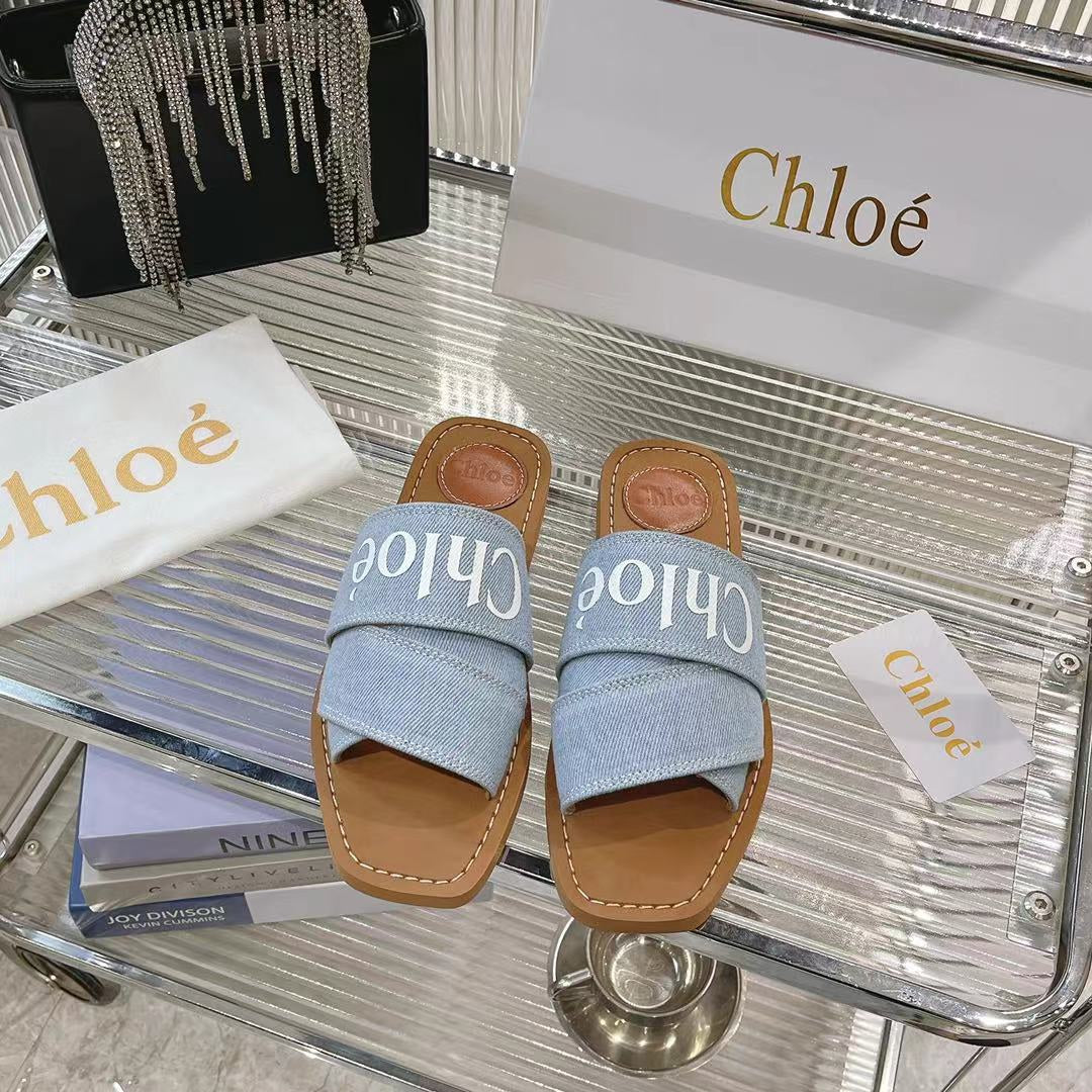 CHLOÉ WOODY MULE IN LIGHT BLUE DENIM WITH WHITE LOGO