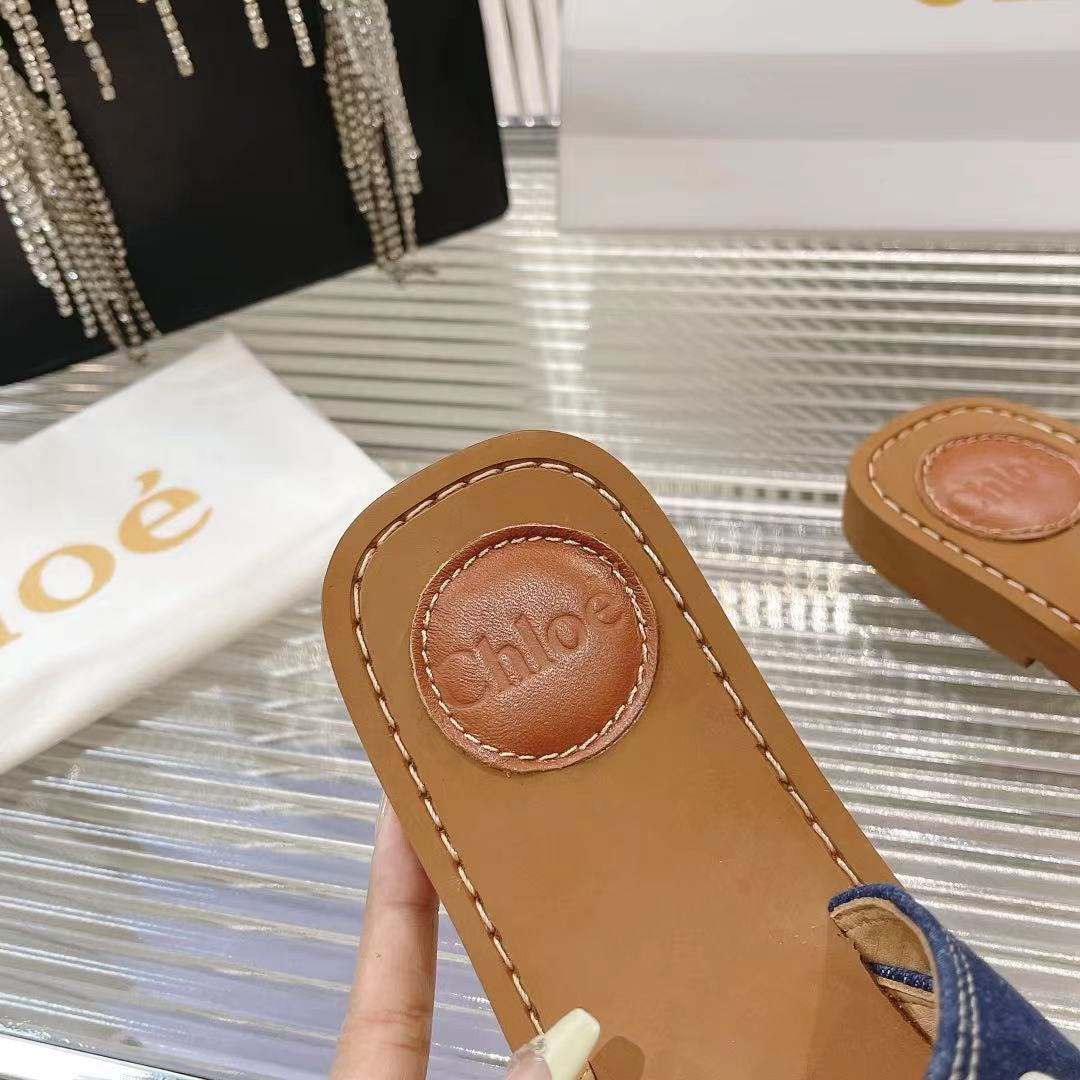 CHLOÉ WOODY MULE IN NAVY BLUE DENIM WITH WHITE LOGO